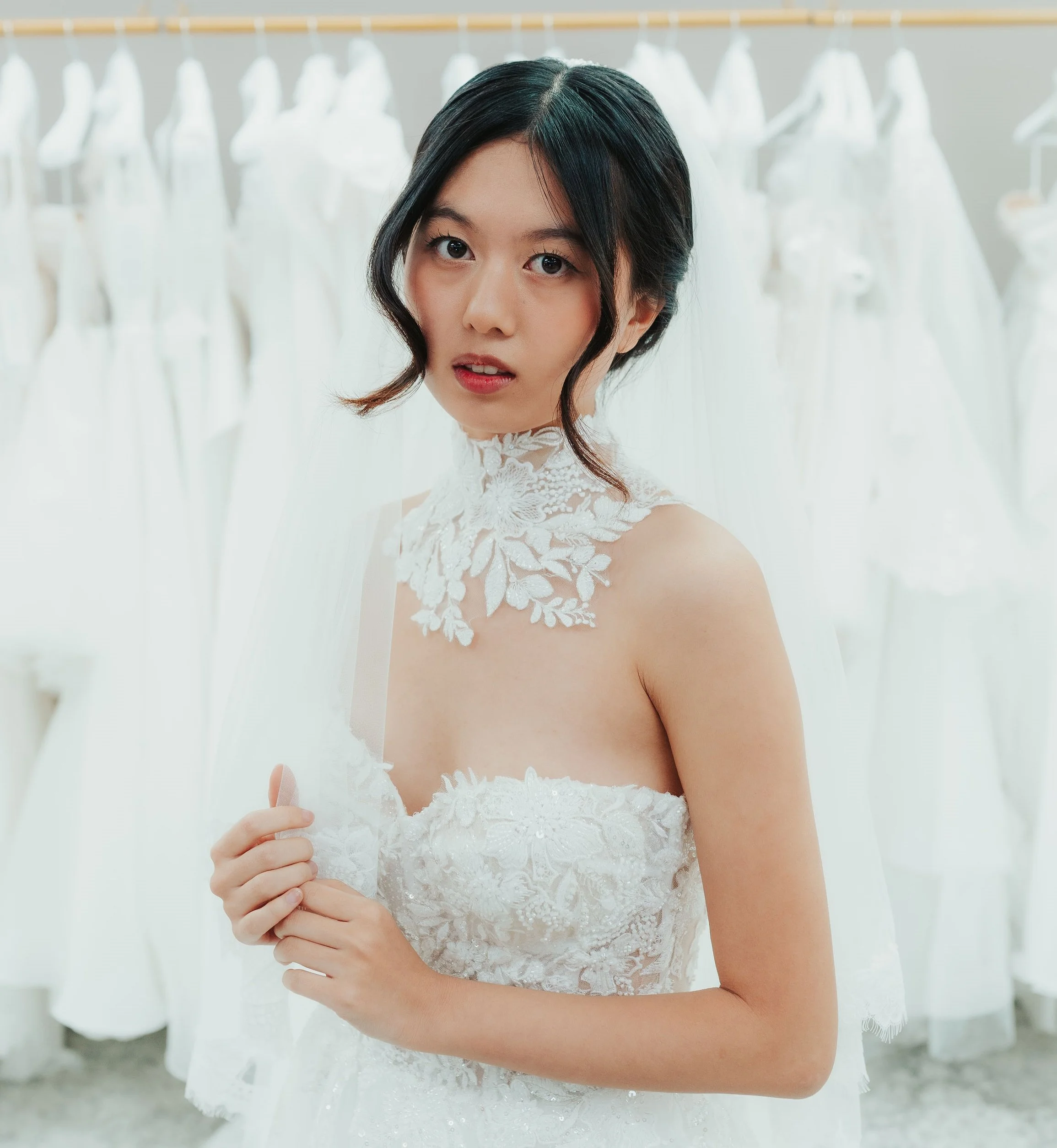 Soft, romantic look for a bride - low bun and red lips