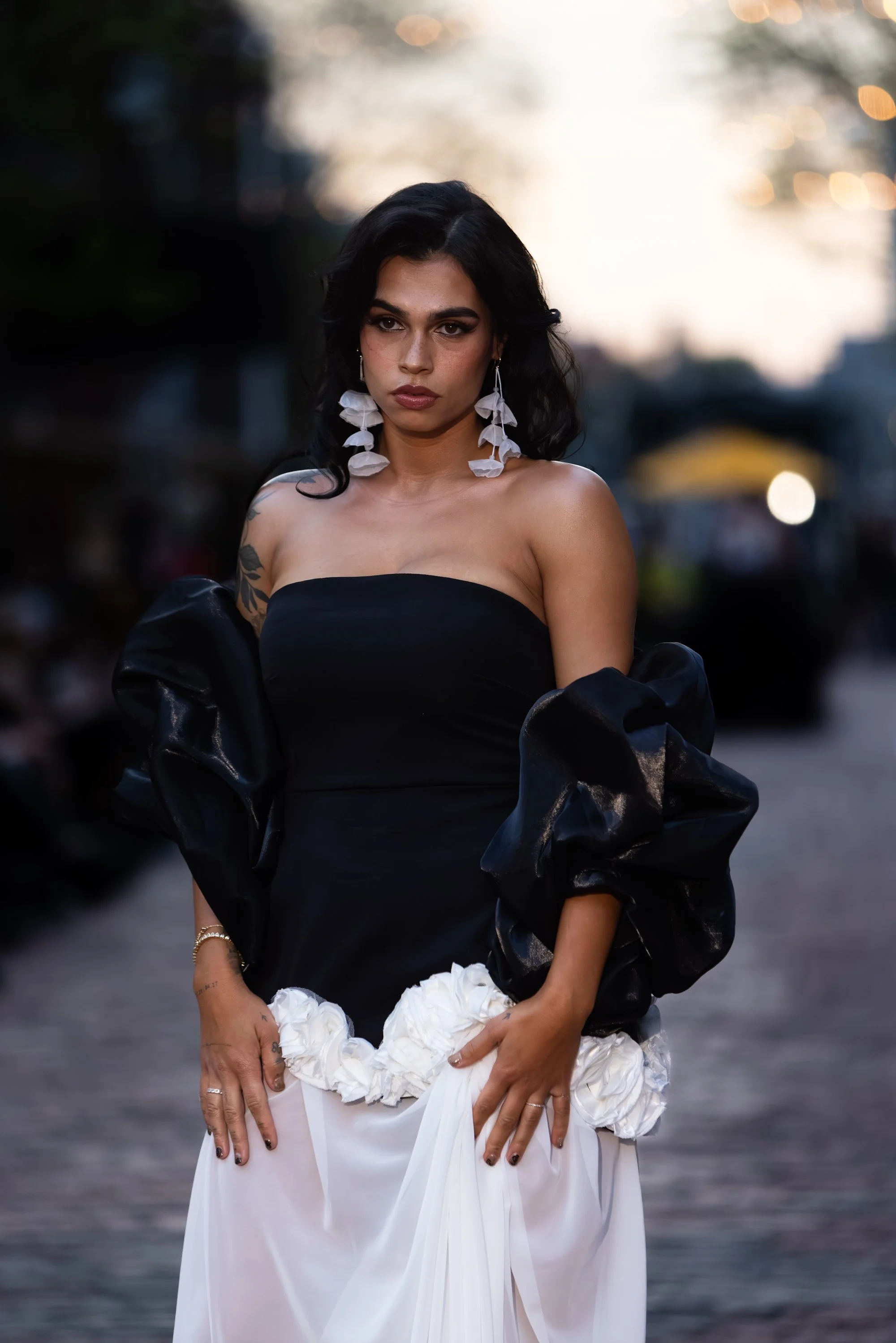 Elegant evening glam makeup featuring defined eyes and bold magenta lips