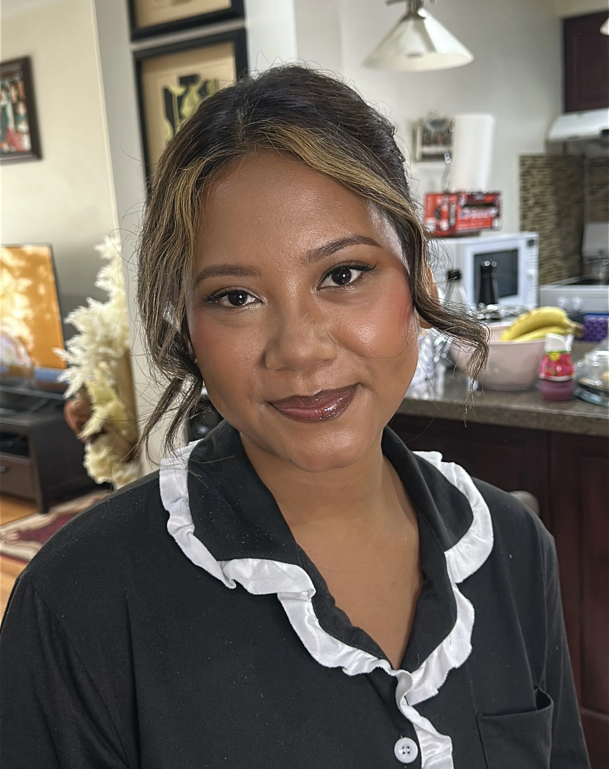 Bride with a medium skin tone wearing soft glam bridal makeup, softly defined eyes, and a nude lip by Toronto makeup artist Alanna Tran.