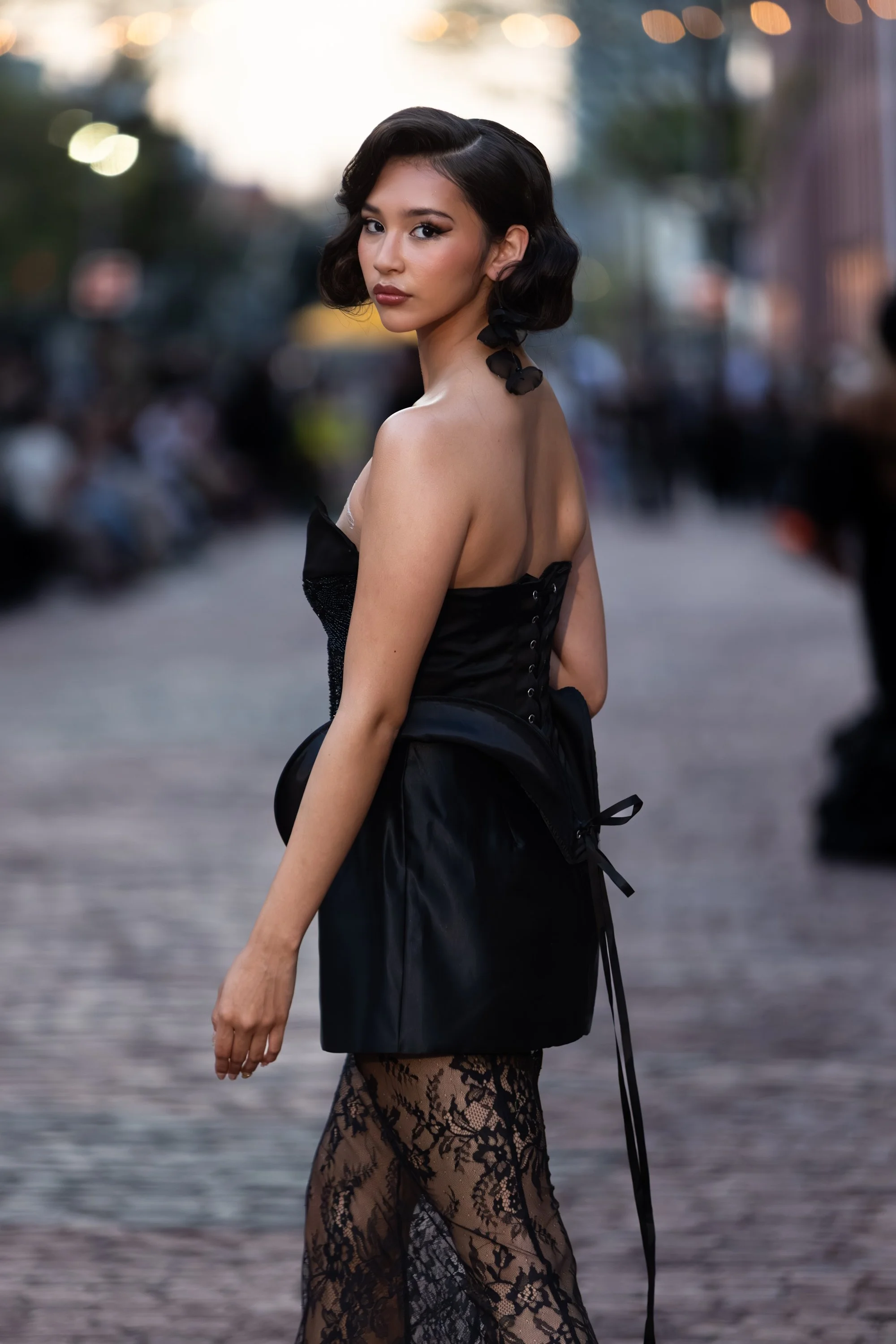 Classic glam makeup featuring sharp winged eyeliner and a flawless skin finish