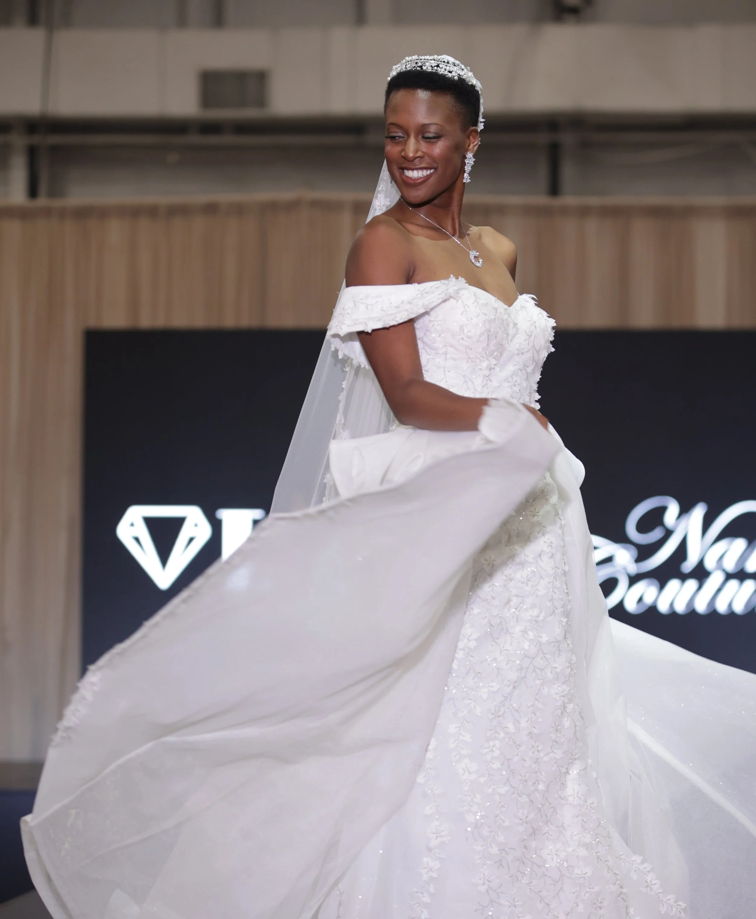 Natural bridal makeup that enhances her radiant smile.