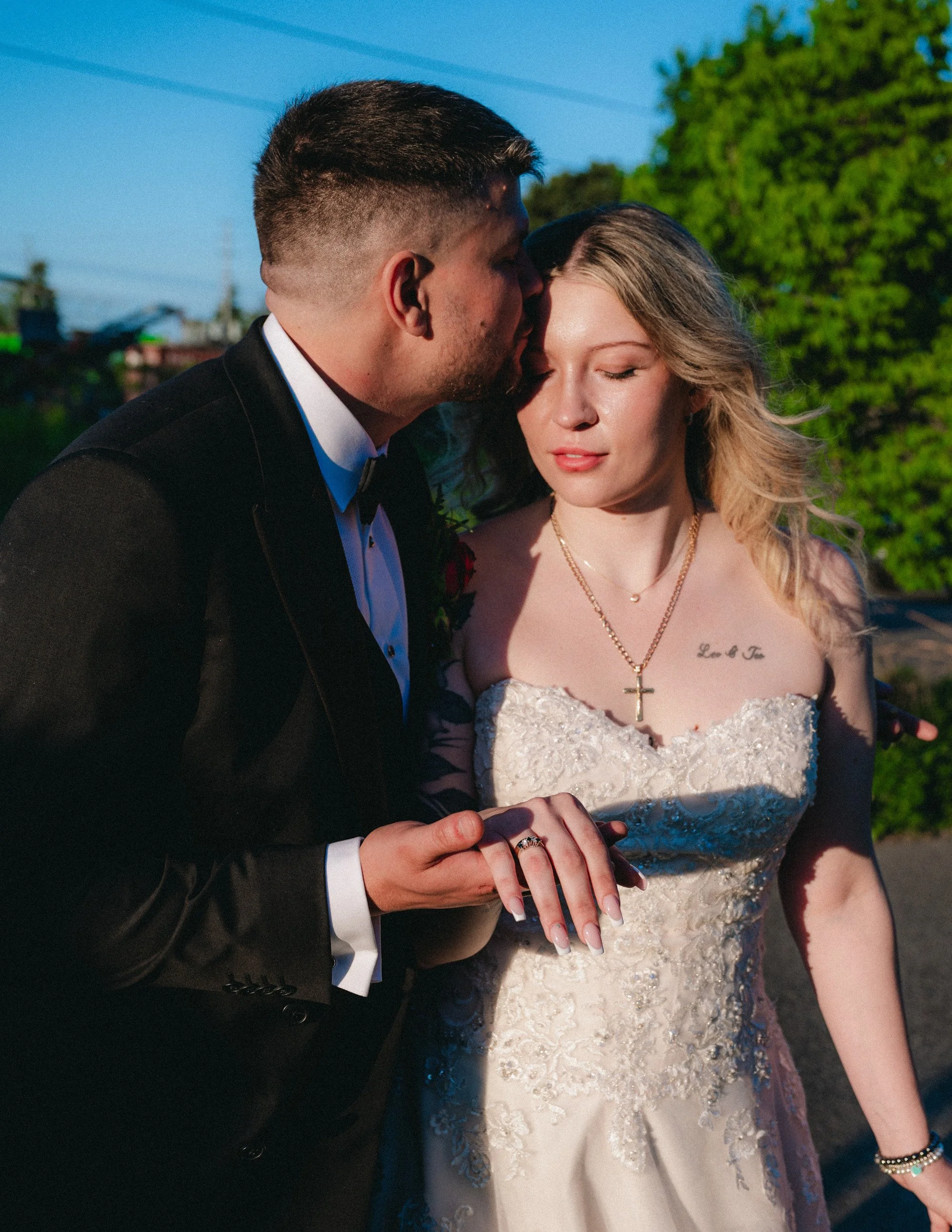 Bride on her wedding day with romantic waves and soft glam bridal makeup.