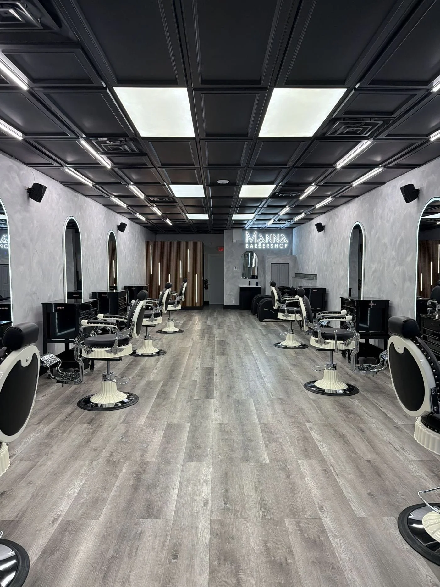 Barbershop interior with stations and lighting