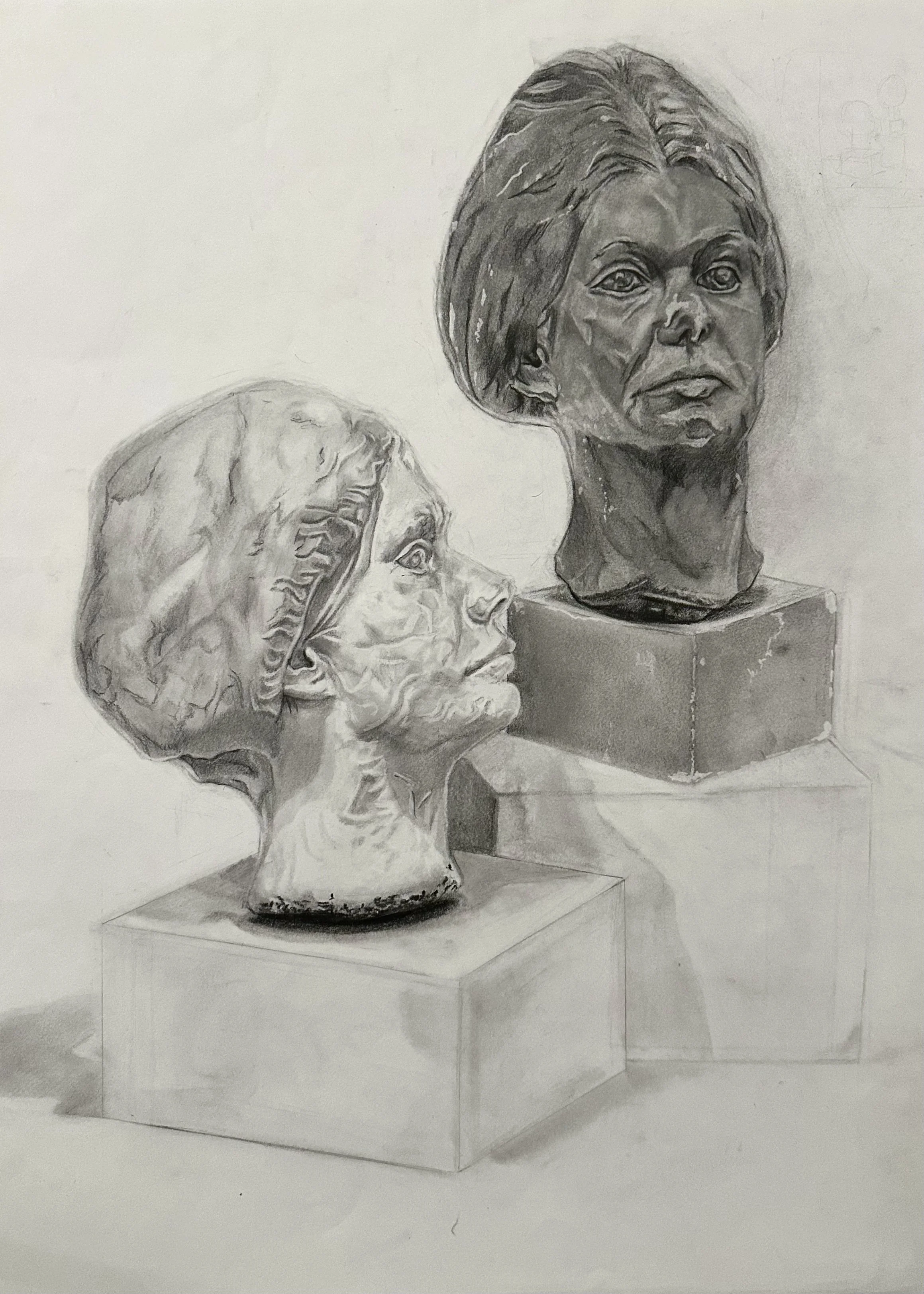 A pencil sketch of two sculpture busts displayed on geometric pedestals. One bust is of an elderly woman with detailed facial wrinkles and a contemplative expression, and the second is a detailed profile view of a woman with wavy hair.