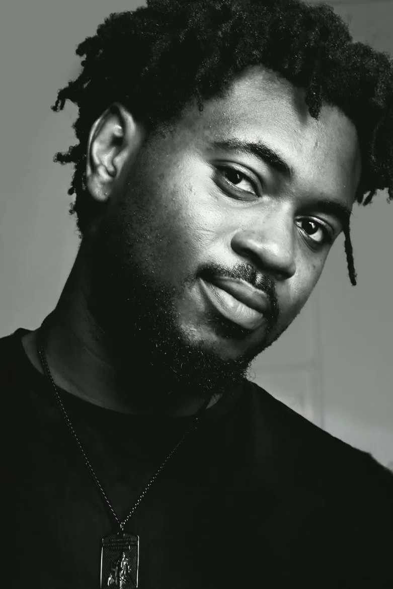 Professional portrait of photographer Daniel in his studio, creative director and commercial beauty photographer based in London.