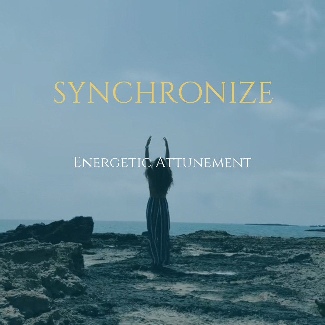 A person standing on rocks by the sea, with hands raised above their head, overlooking the water. The sky is cloudy, and the image has overlay text that says 'SYNCHRONIZE' and 'ENERGETIC ATTUNEMENT'.