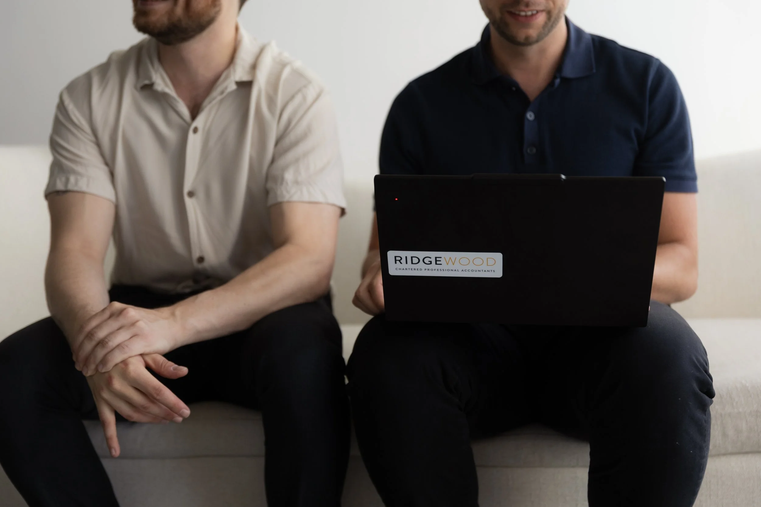 Two bookkeepers working on a catch-up bookkeeping project