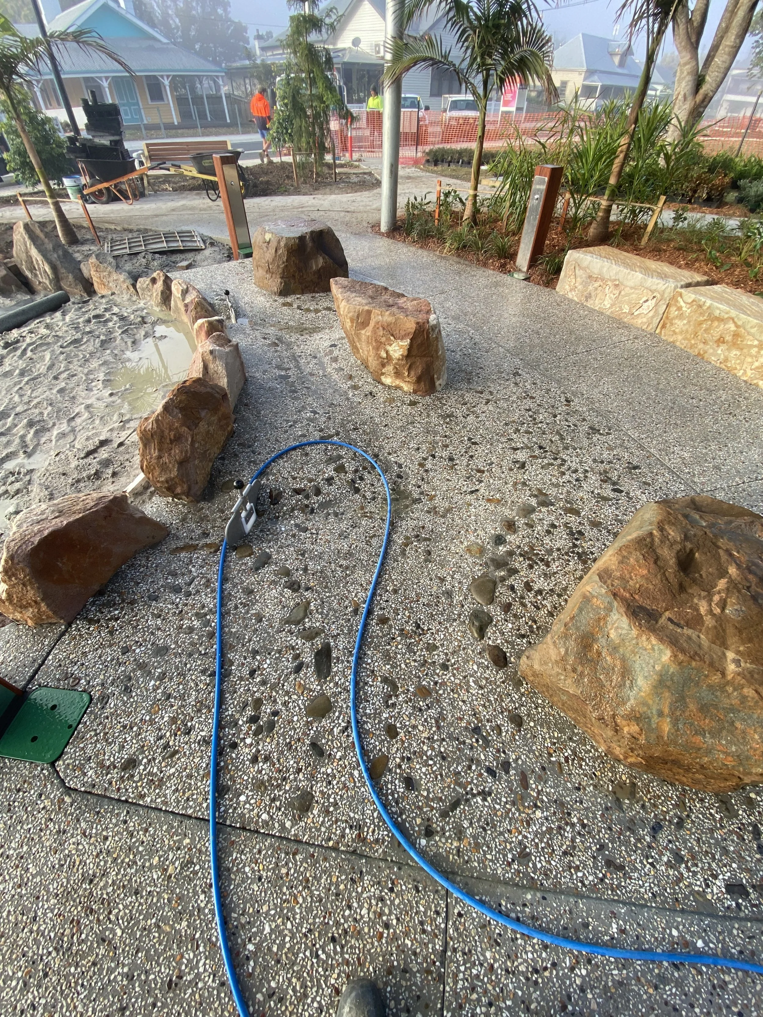 Exposed aggregate concrete works for a civil project with Clarence Valley Council, building a new water park feature in a children's playground in Ulmarra.