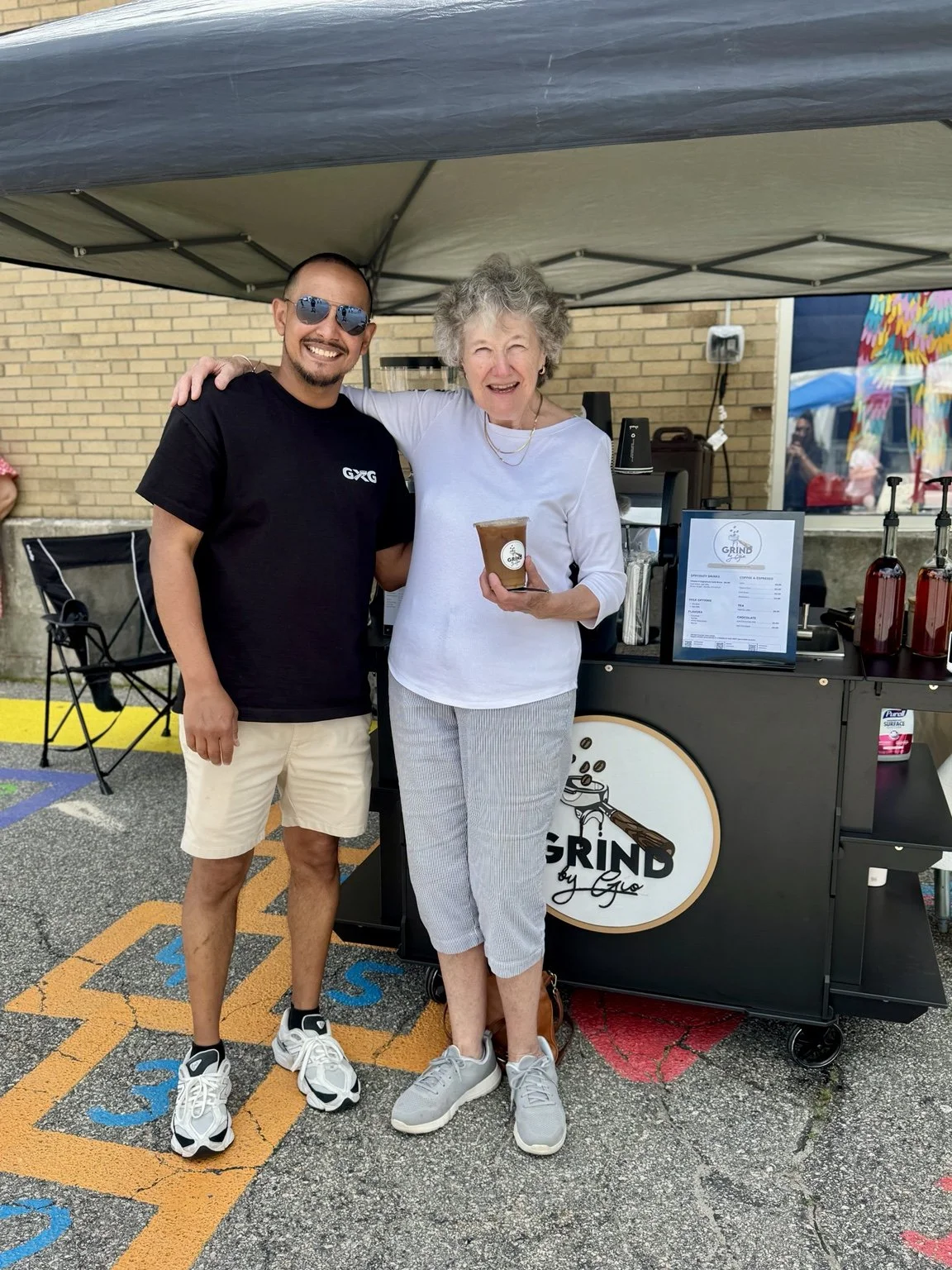 Gio and a guest at a Grind by Gio community event
