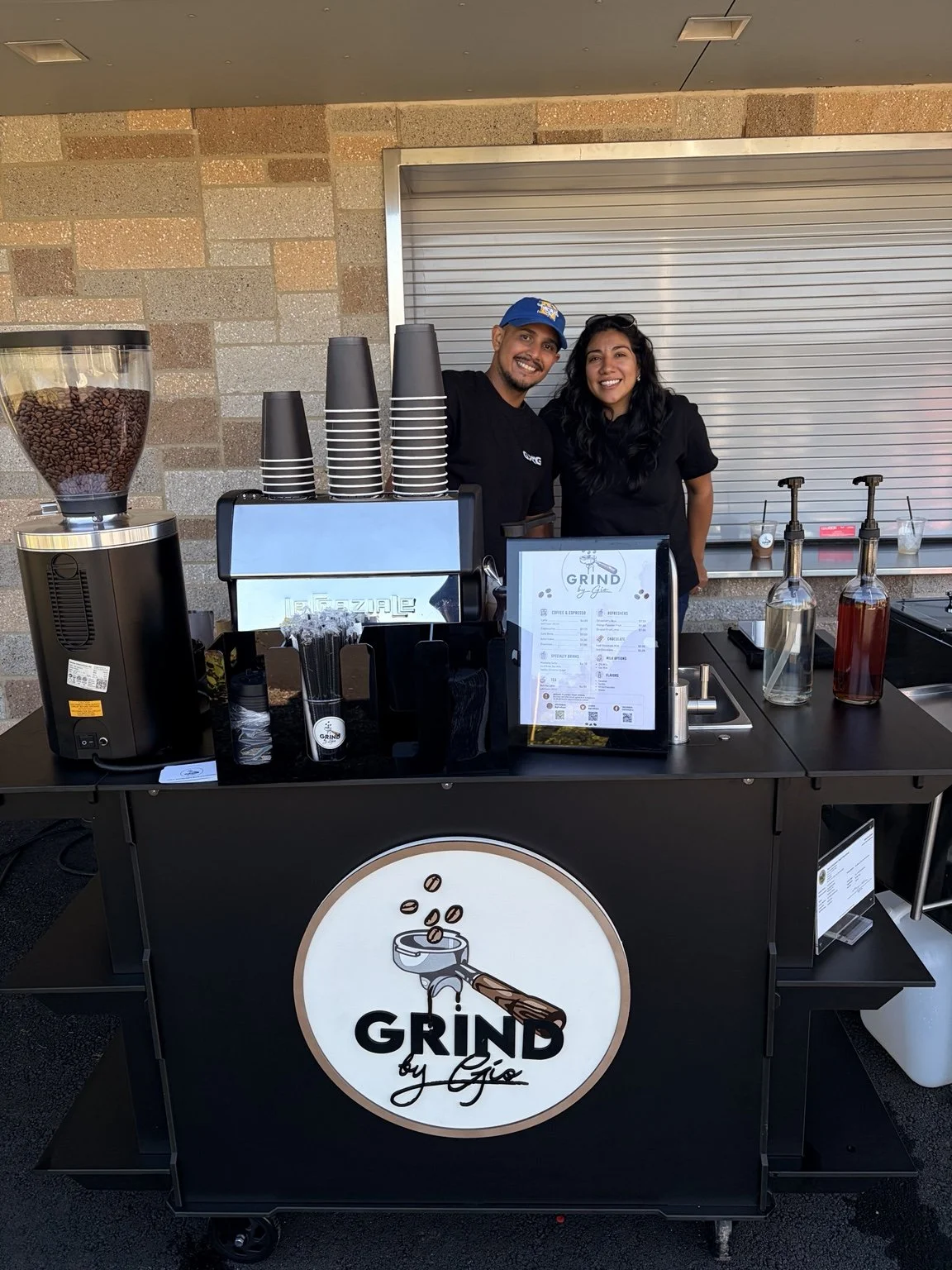 Flor and Gio with their Grind by Gio mobile espresso cart