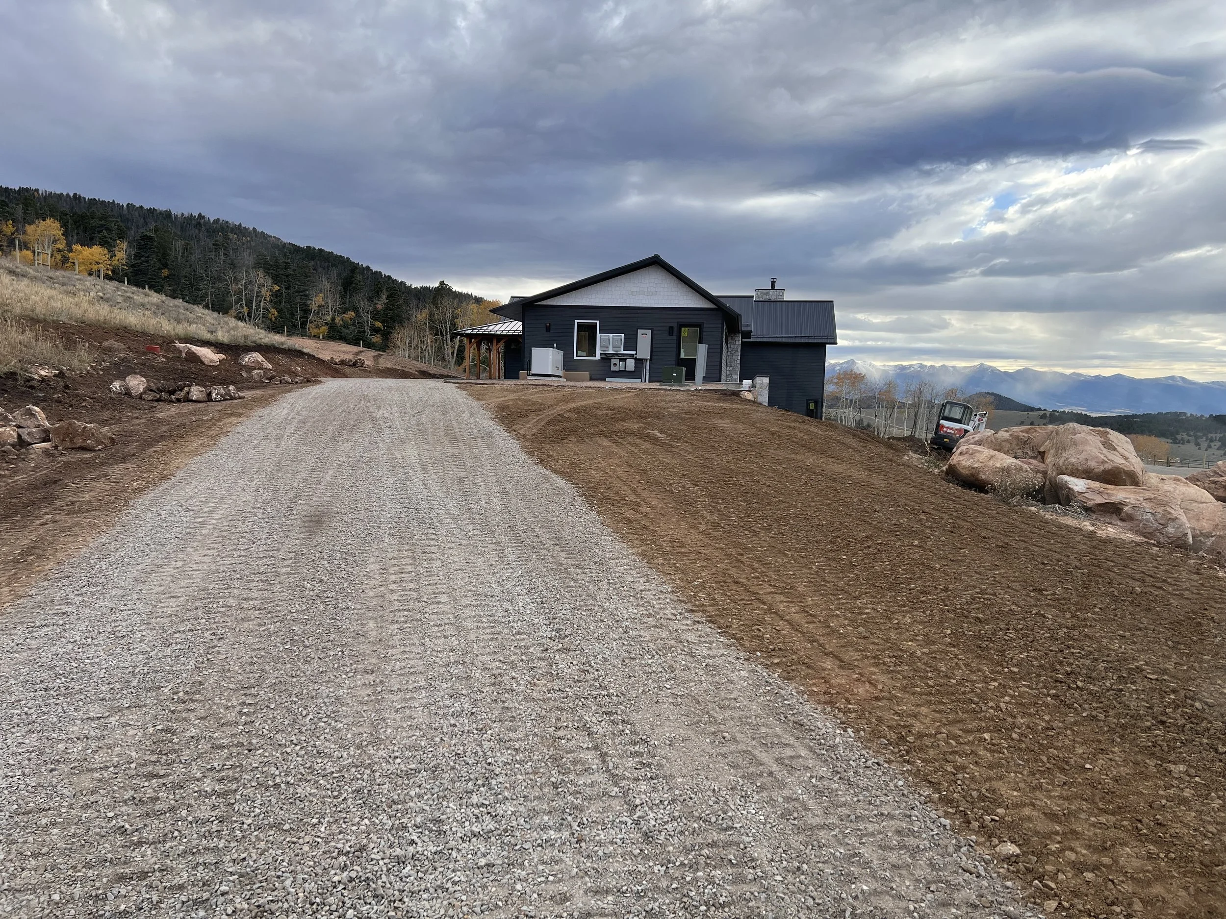 Road base driveway in Colorado by American Demo and Dirt.