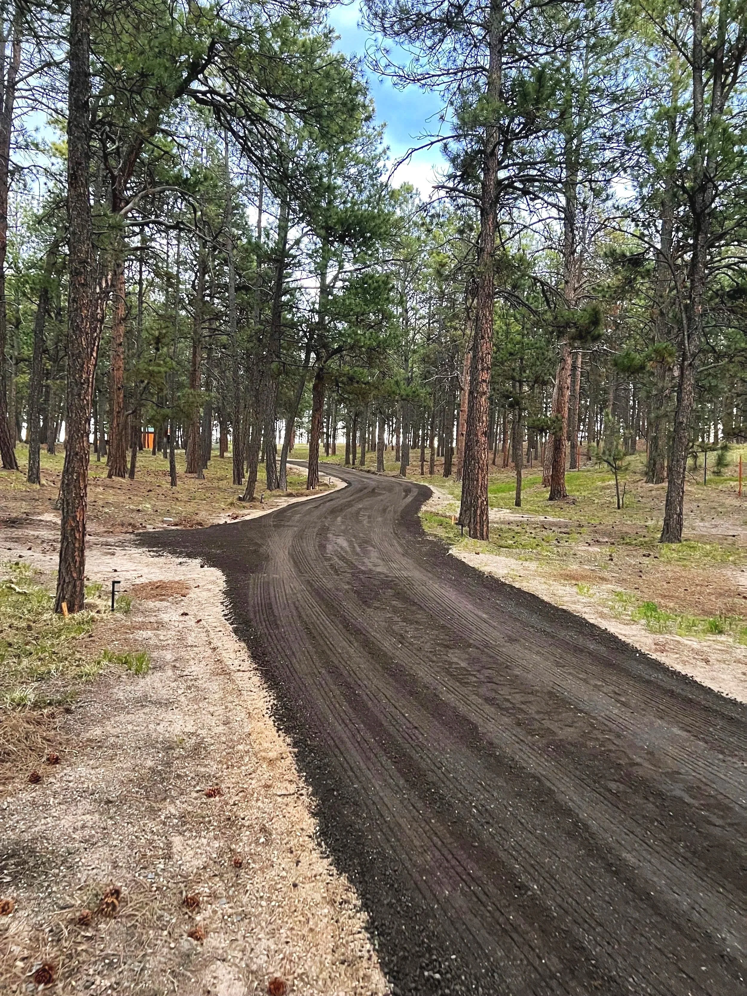 Crushed asphalt driveway in Black Forest, Colorado, by American Demo and Dirt LLC