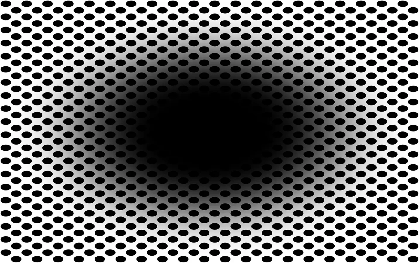 A still image of a dark oval surrounded by black dots, creating the illusion of an expanding hole.