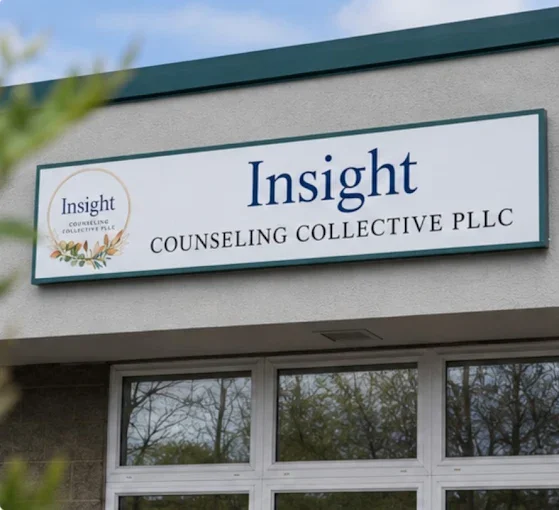 Sign for Insight Counseling Collective PLLC on the exterior of a building.