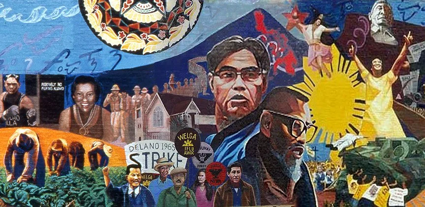 A mural depicting influential figures from the civil rights movement, including protesters, activists, and symbolic imagery representing struggle and liberation.