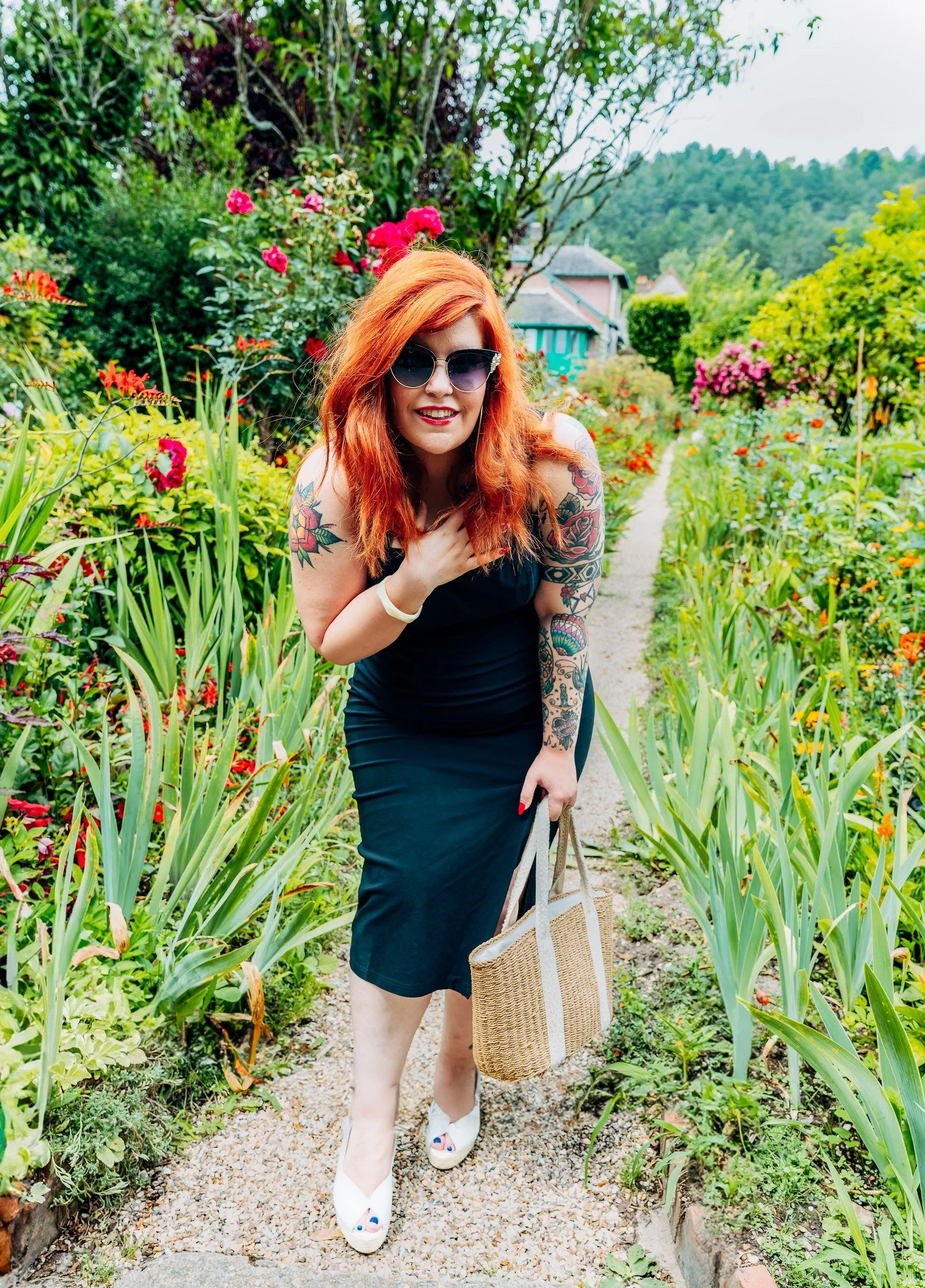 Promotional portrait of singer Cecilya Mestres inside the historic Claude Monet gardens in Giverny, France.