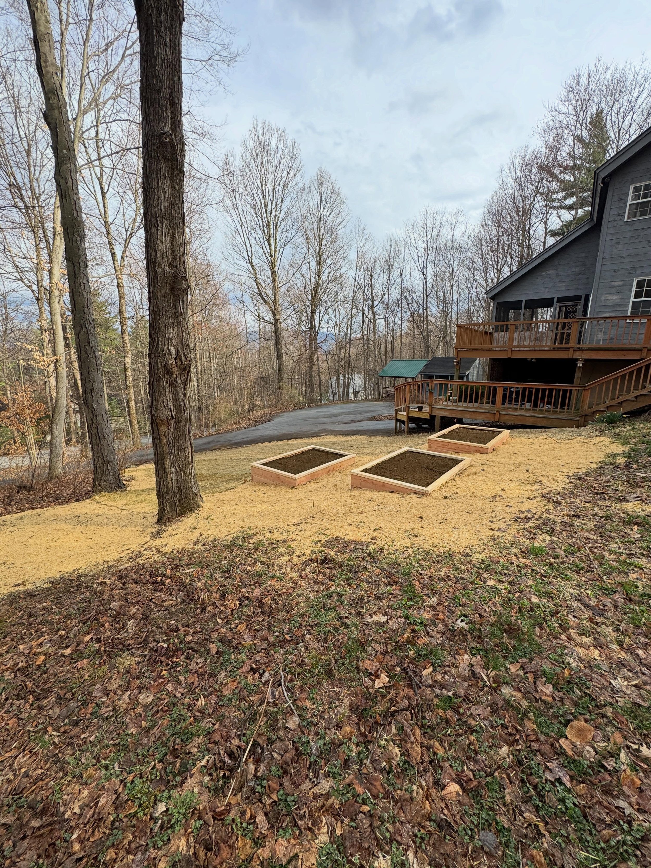 📍Arlington, VT. From prickers, old compost bins, and stumps, to a smooth grassy hill. We embedded grow boxes into the hill to last for years to come.