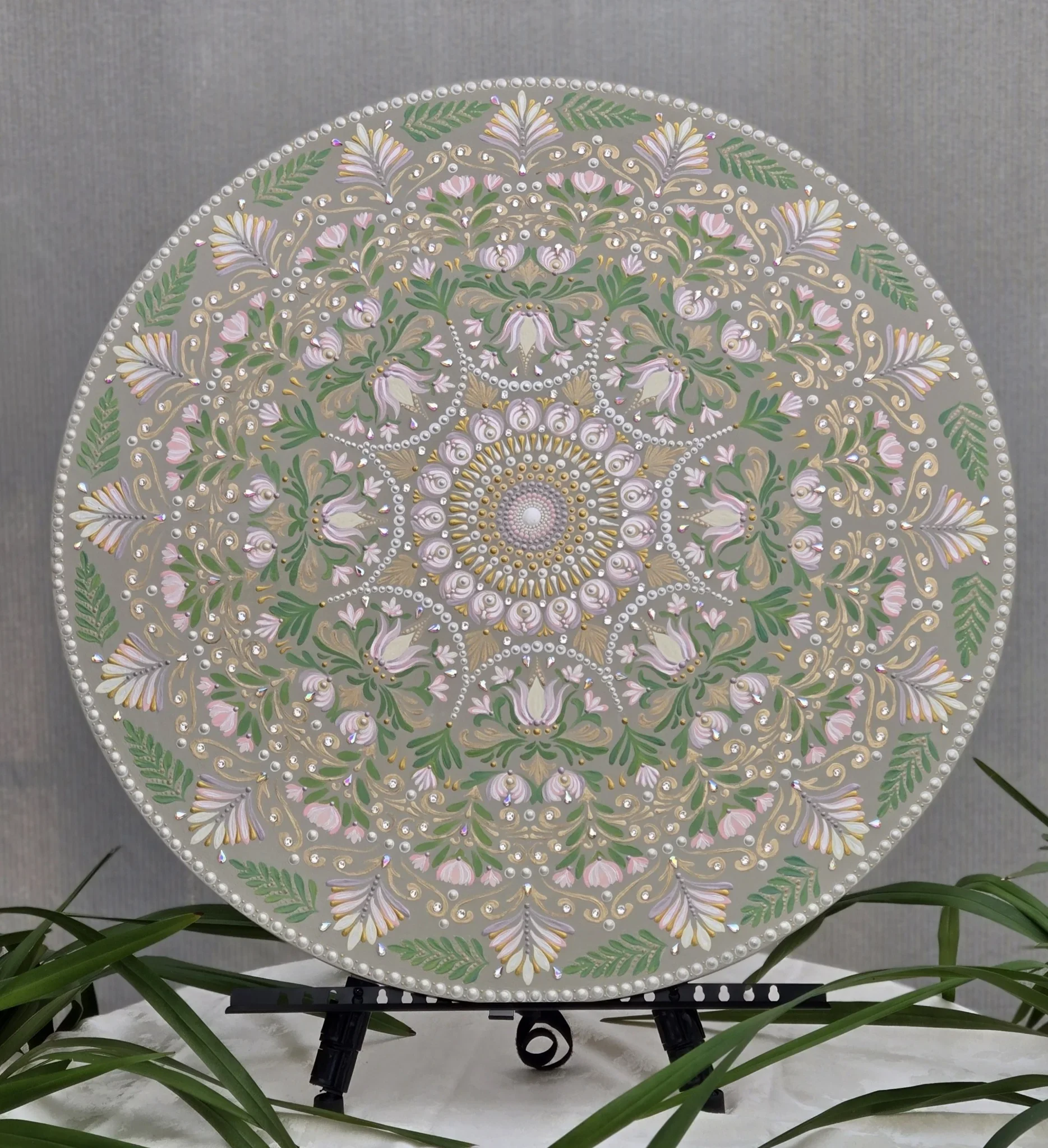 Large hand-painted mandala wall art on a 36-inch round birch wood canvas featuring blush pink, lavender, and gold accents.