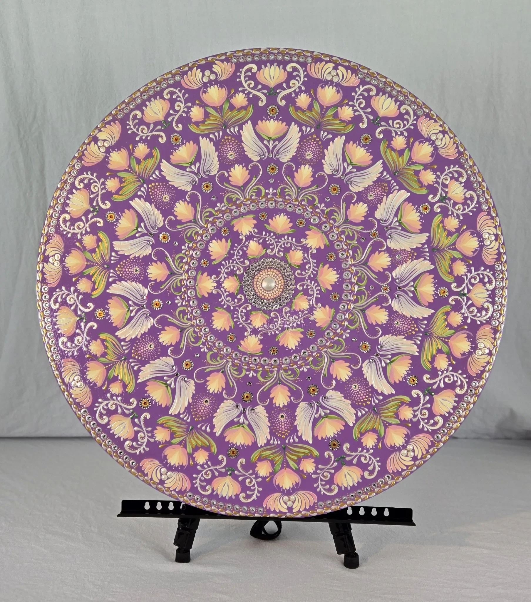 Hand-painted Marilyn Monroe mandala wall art showcasing vibrant colors and intricate dot work.