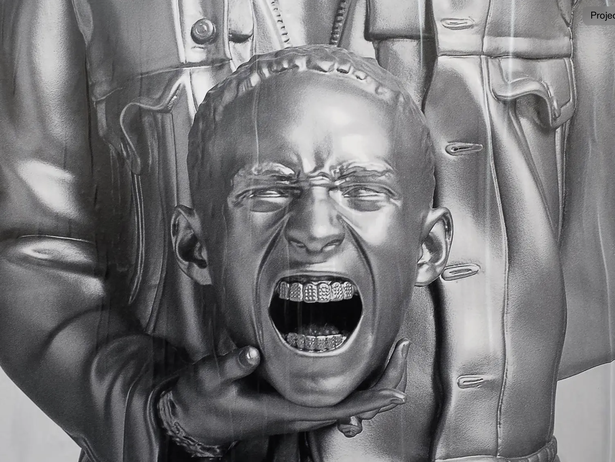 Black and white sculpture of a man's face with glasses, angry expression, mouth open showing teeth, surrounded by various mechanical and metallic elements.