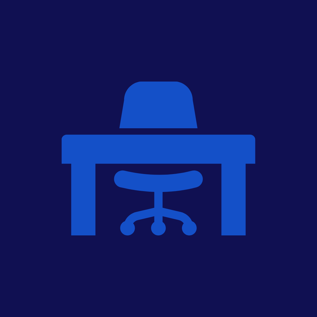 Icono de una oficina con escritorio y silla.