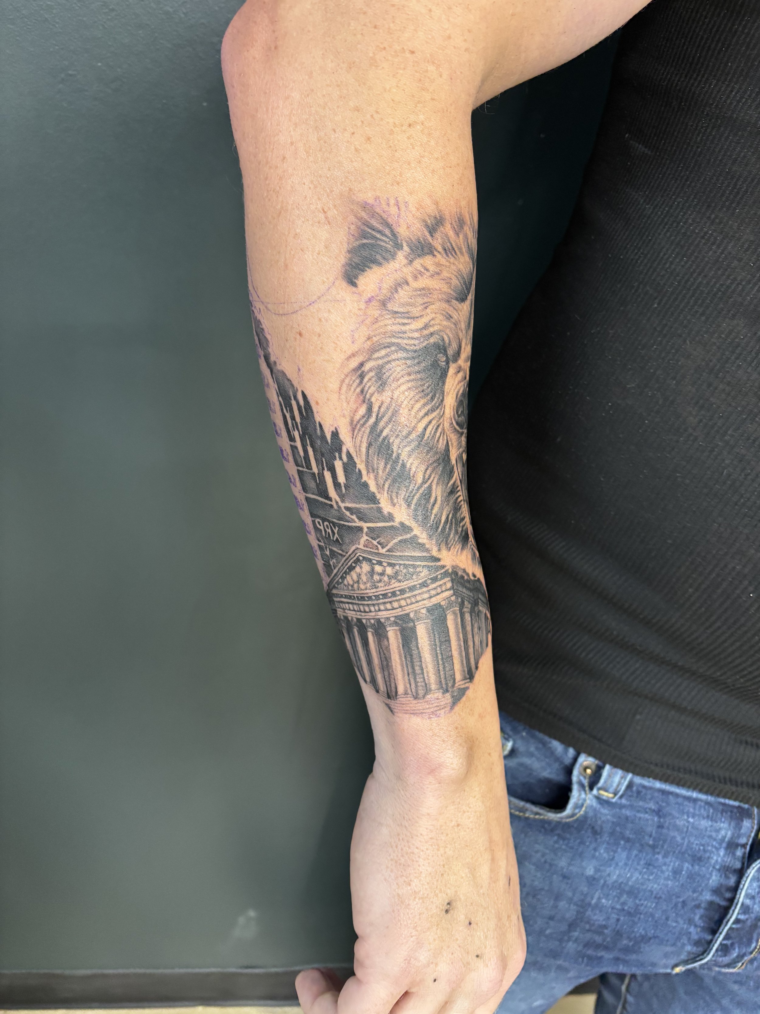 Crypto inspired black and grey realism tattoo on a forearm by Altered Tattoo Co