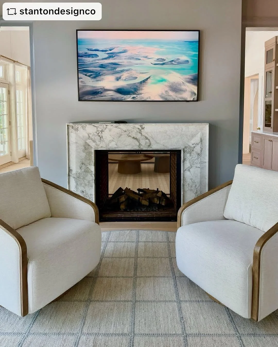 Stitchery Plaid brings quiet sophistication to this beautifully composed sitting area, where its softly defined pattern and subtle shades of oyster and blue-gray complement the room&rsquo;s calming palette. Beneath the sculptural seating, the timeles