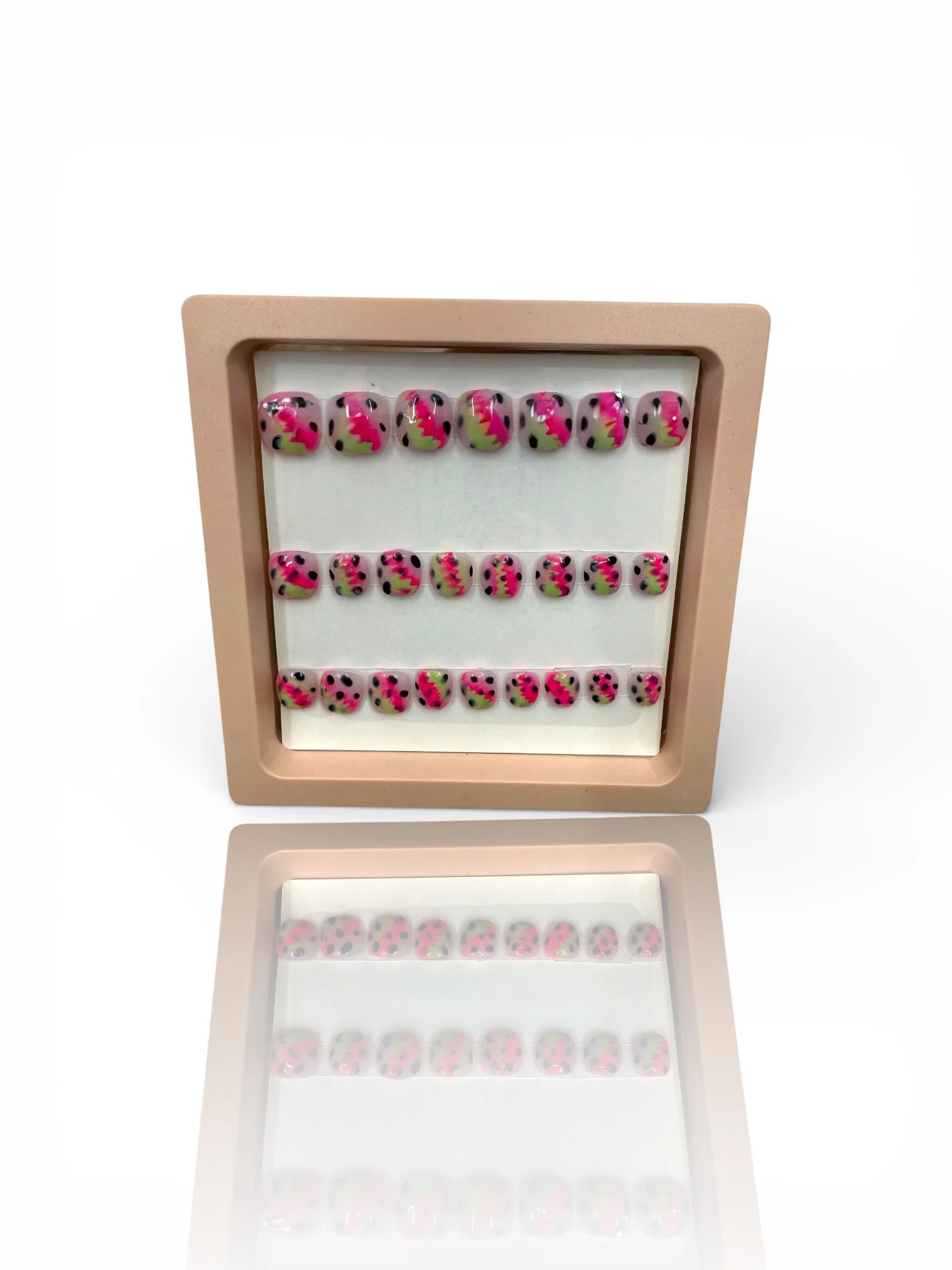 kids Colorful watermelon almond-shaped press-on nails with bright pink fruit designs, green rinds, and black seeds.