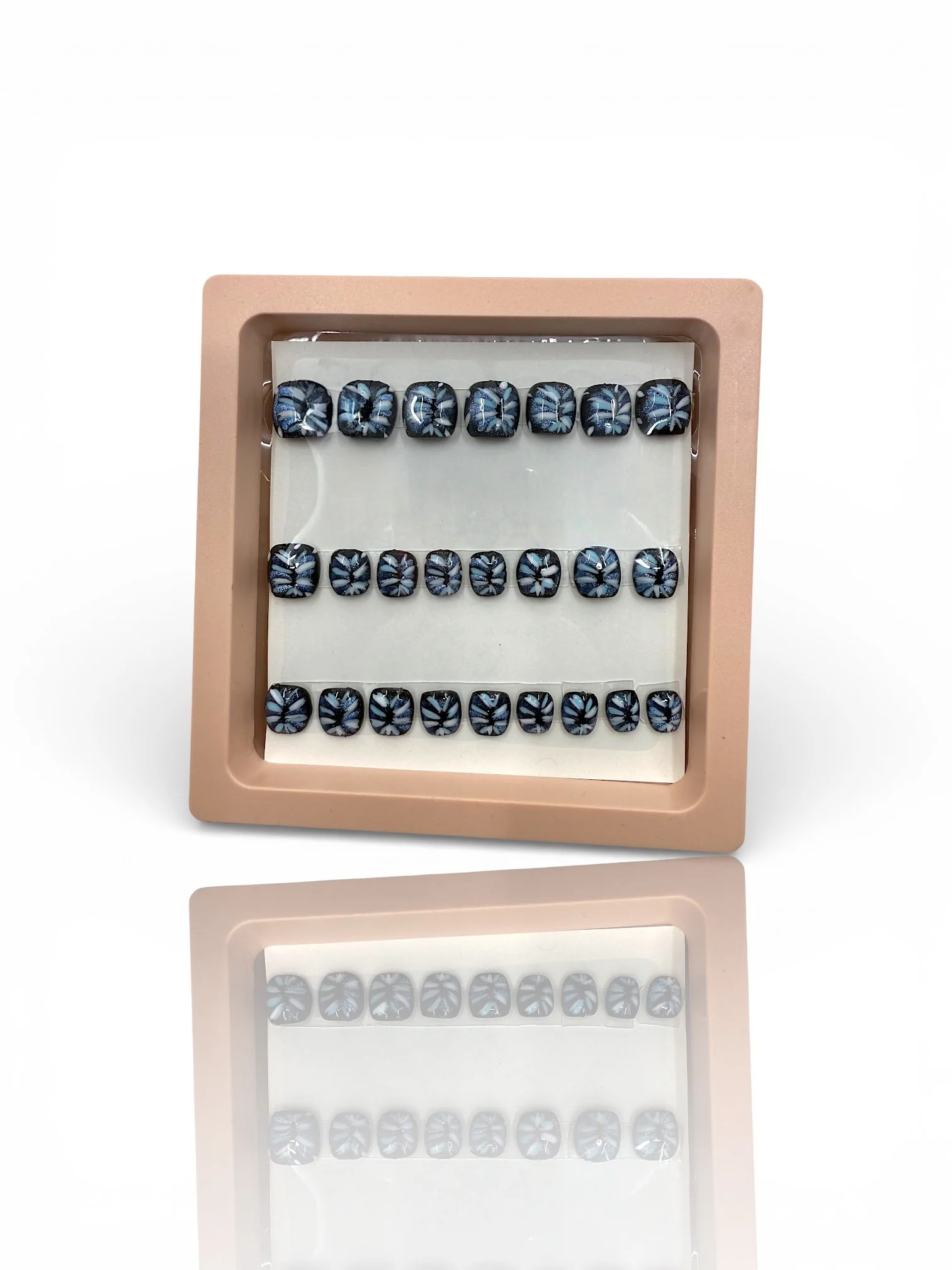 kids Black coffin-shaped press-on nails featuring shimmering silver and white firework designs.