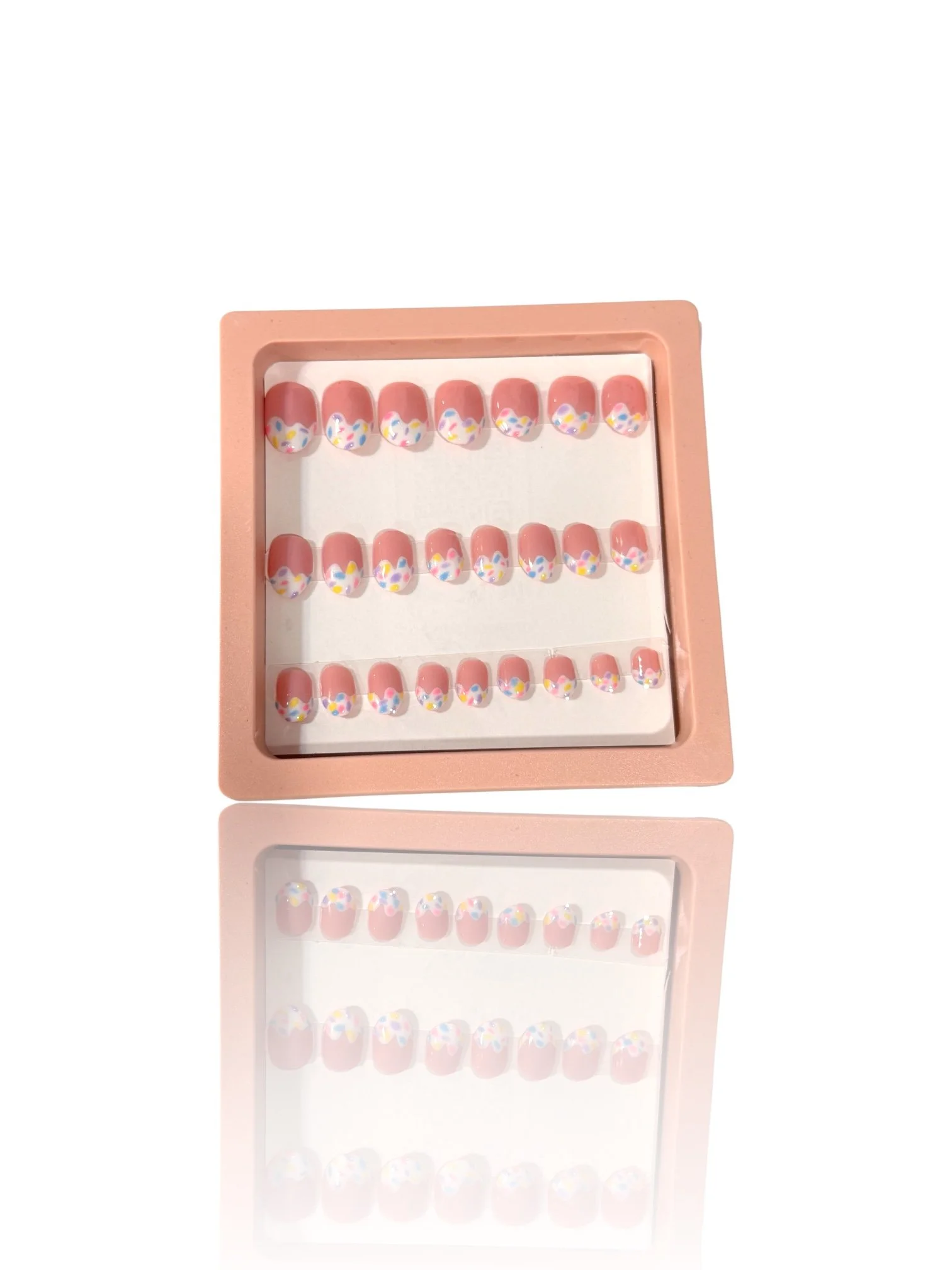 kids Glow-in-the-dark almond press-on nails with glossy pink bases and colorful pastel ice cream-inspired French tips.