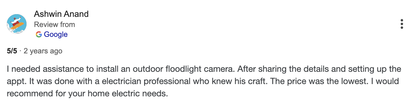 Screenshot of a Google review by Ashwin Anand about installing an outdoor floodlight camera, shared two years ago.