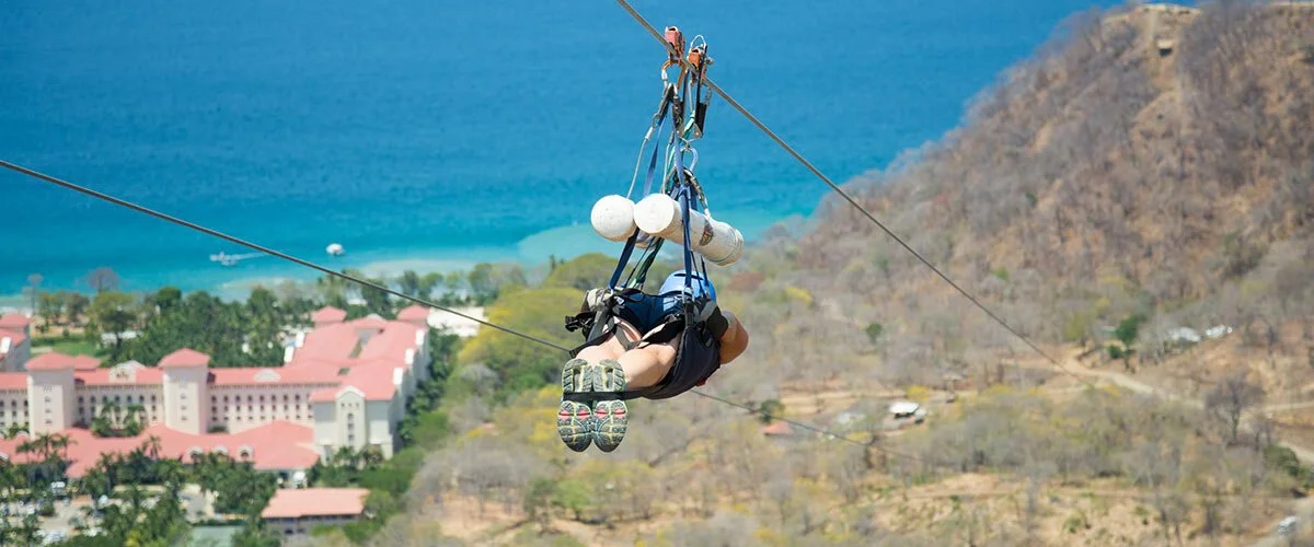 Incentive group ziplining through the Costa Rica landscape
