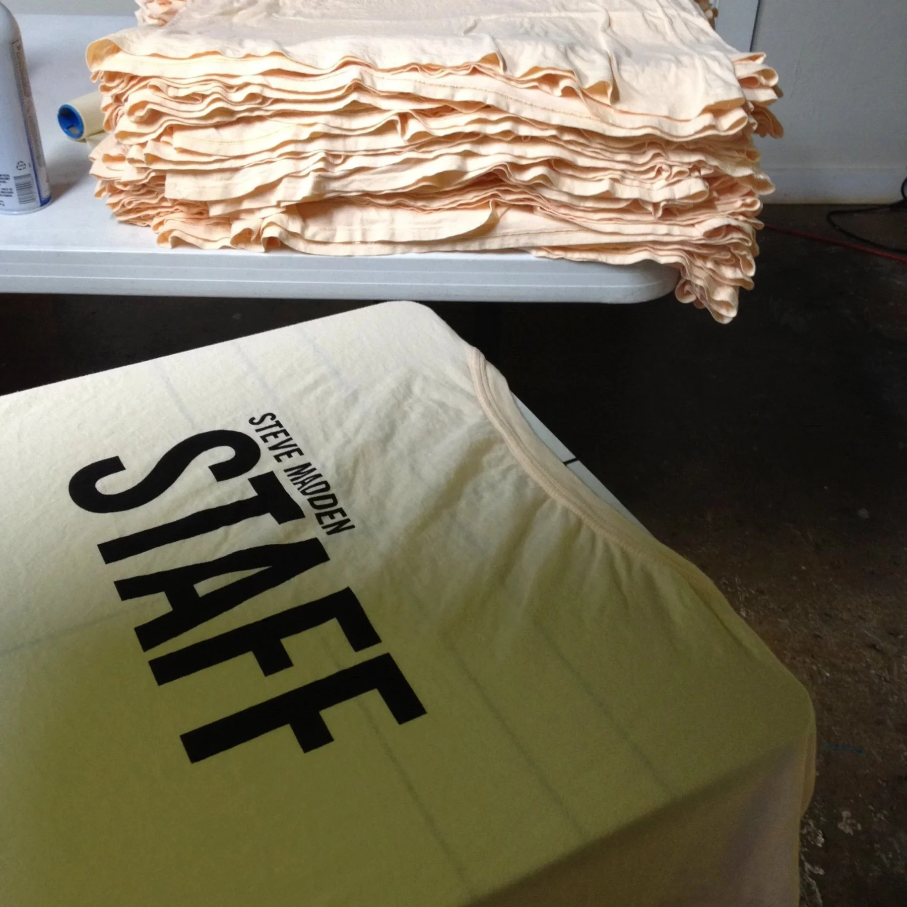 Screen printed custom shirts for Steve Madden staff at an event in Austin.