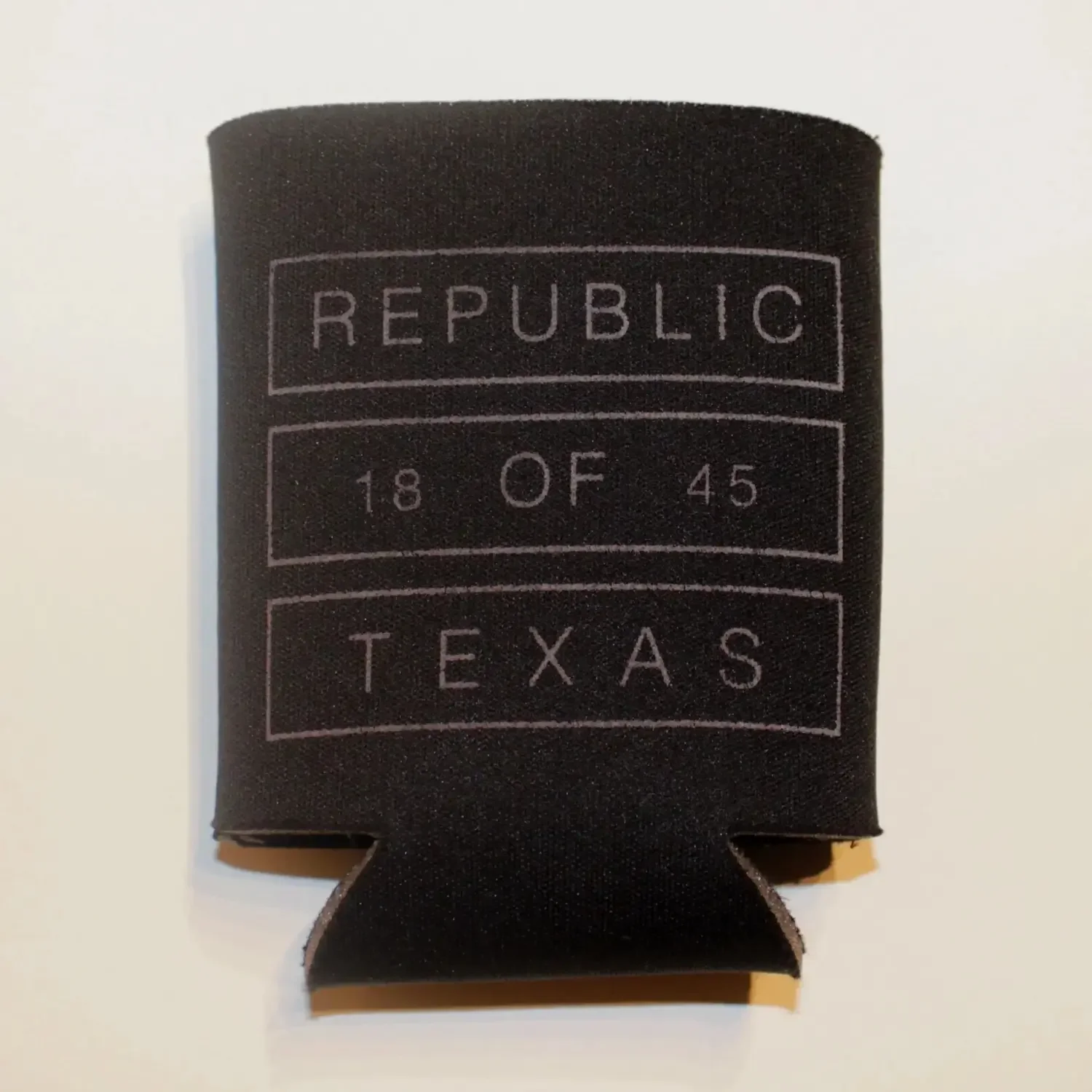 Custom screen printed promotional koozie for retail souvenir store in Austin, Texas.