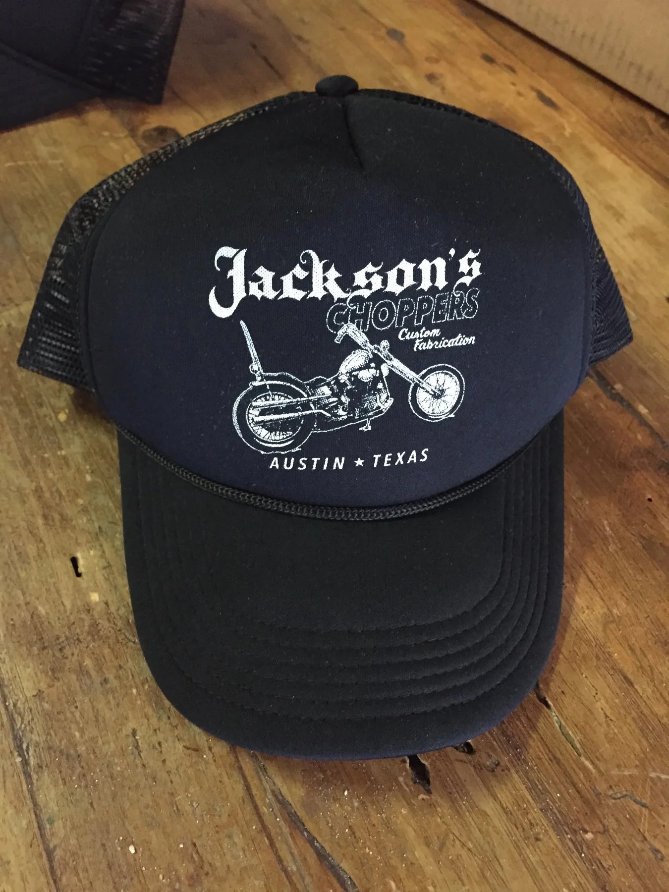 Custom screen printed foam trucker hats and motorcycle merchandise produced for Jackson's Choppers in Austin TX.