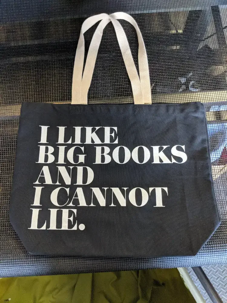 Custom screen printed retail canvas tote back for book store in Austin Texas.
