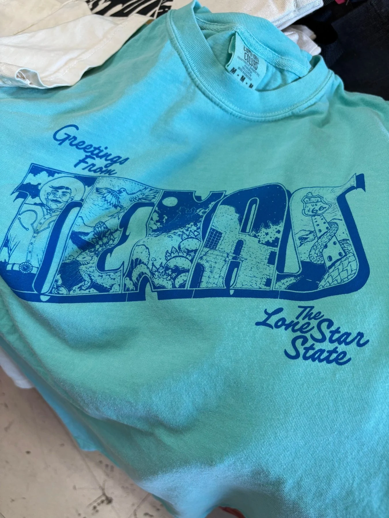 Private label custom screen printed retail t-shirts produced in Austin TX.