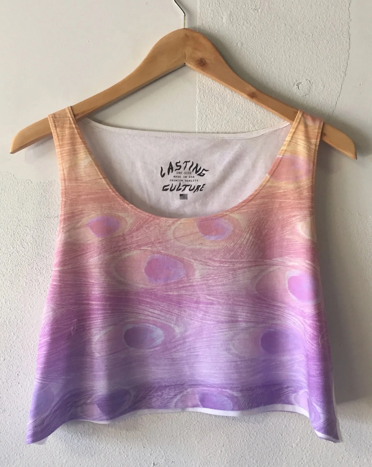 Private label custom screen printed retail tank tops with printed neck tags in Austin TX.