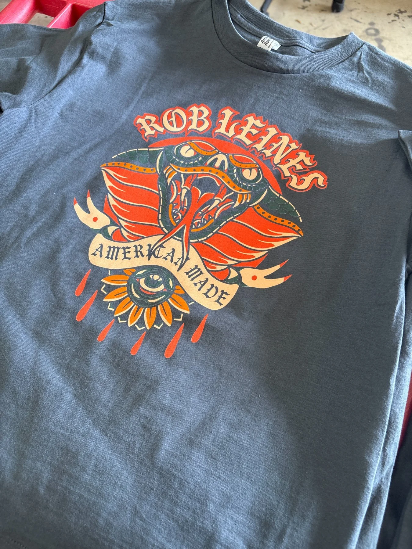 Custom screen printed band merchandise t-shirts produced for Rob Leines in Austin TX.