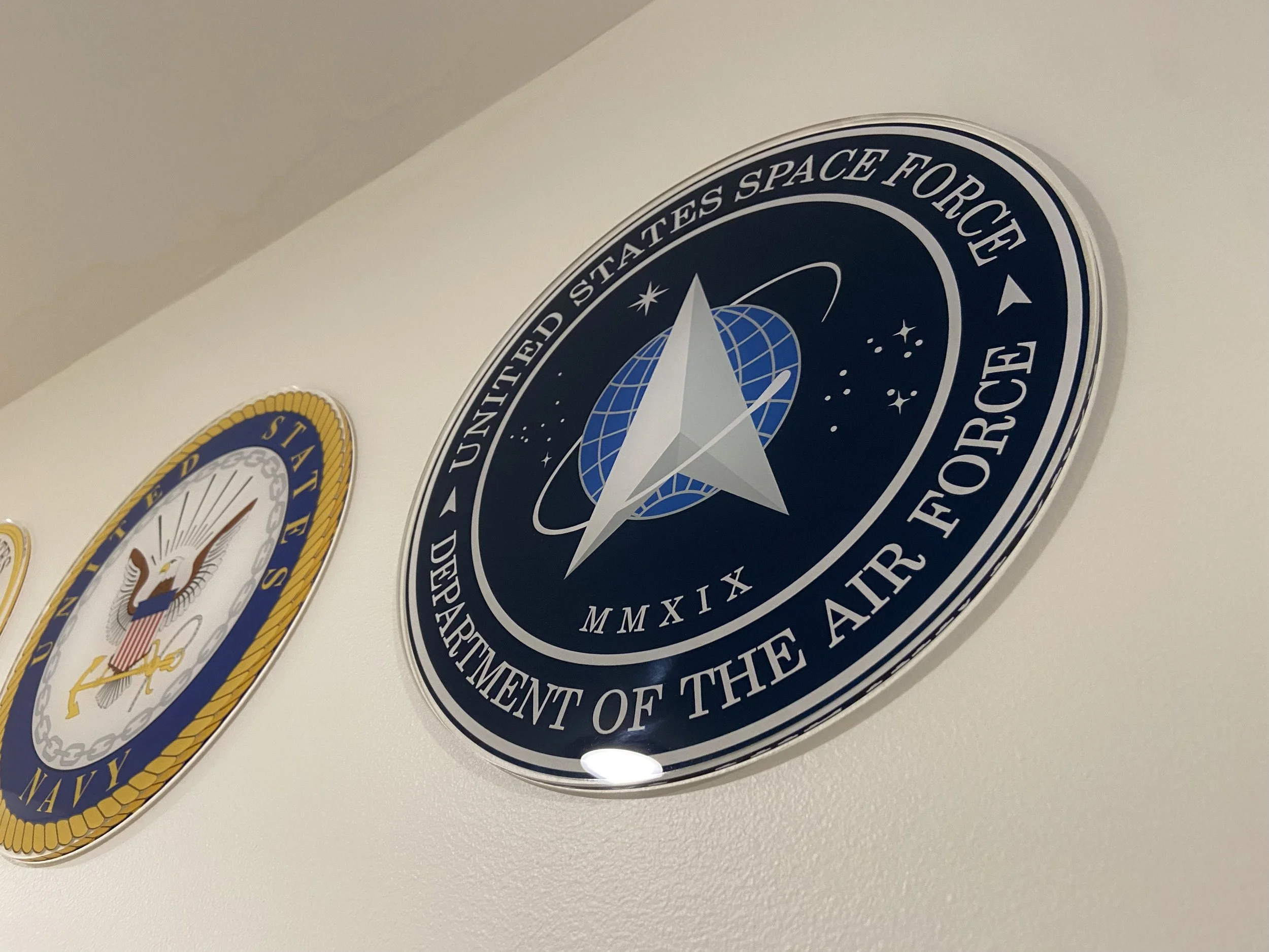 United States Space Force seal reverse printed on clear acrylic with polished edges. Printing on the backside allows the acrylic to provide the nice, glossy, front.