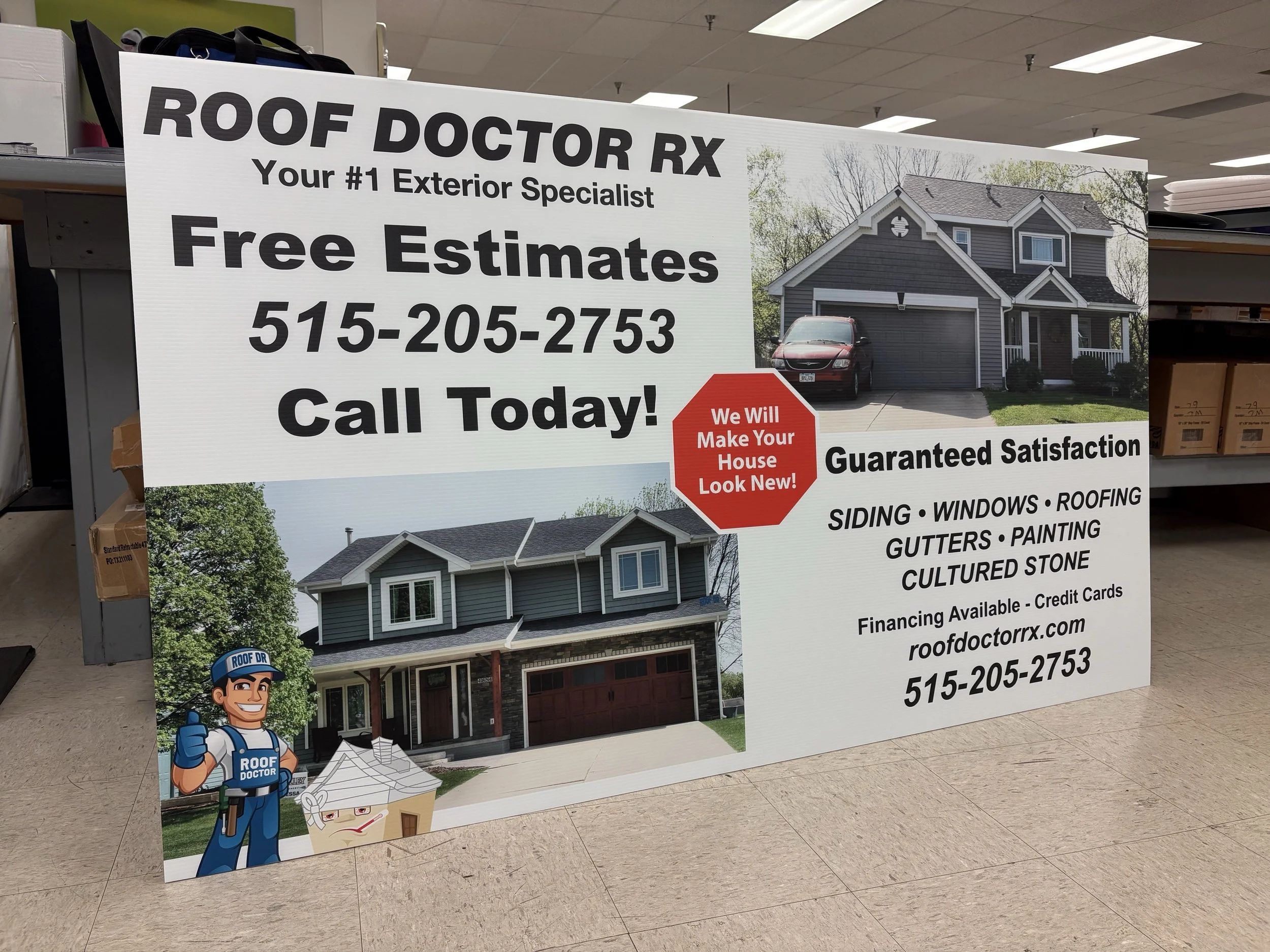 Sign advertising Roof Doctor RX, an exterior home renovation company, featuring a photo of a house with a garage and a red car parked in the driveway. The sign offers free estimates and displays a phone number for contact.