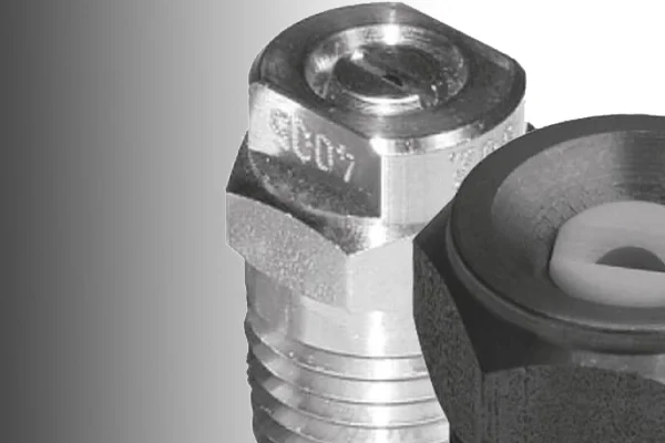 Close-up of a metal bolt and a rubber grommet or washer.