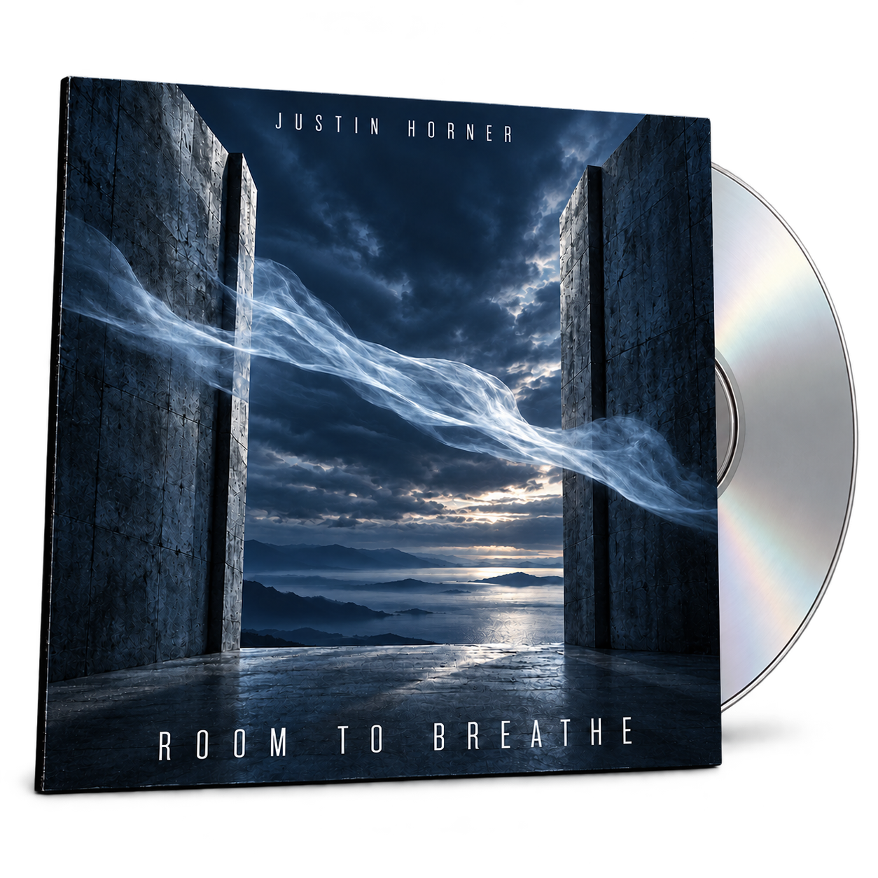 Music album cover with a dark blue cloudy sky, mountains, and water scene. The album is titled 'Room to Breathe' by Justin Horner, featuring a surreal open door with swirling mist or smoke.