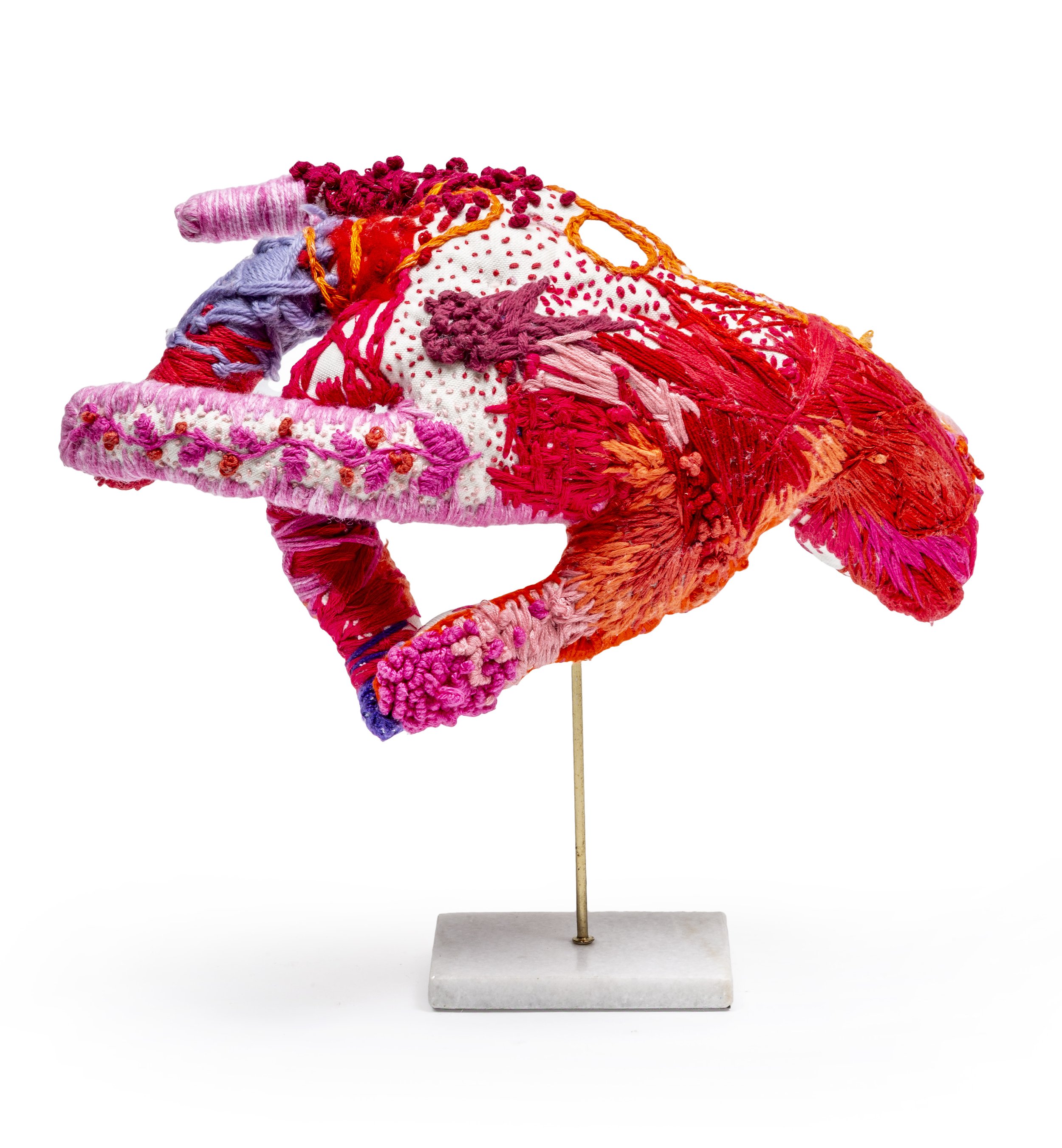 Party Trick                                                       2026
Cotton, linen, wool, silk dacron fibre, brass, stone                                                                               35 x 34 x 14cm