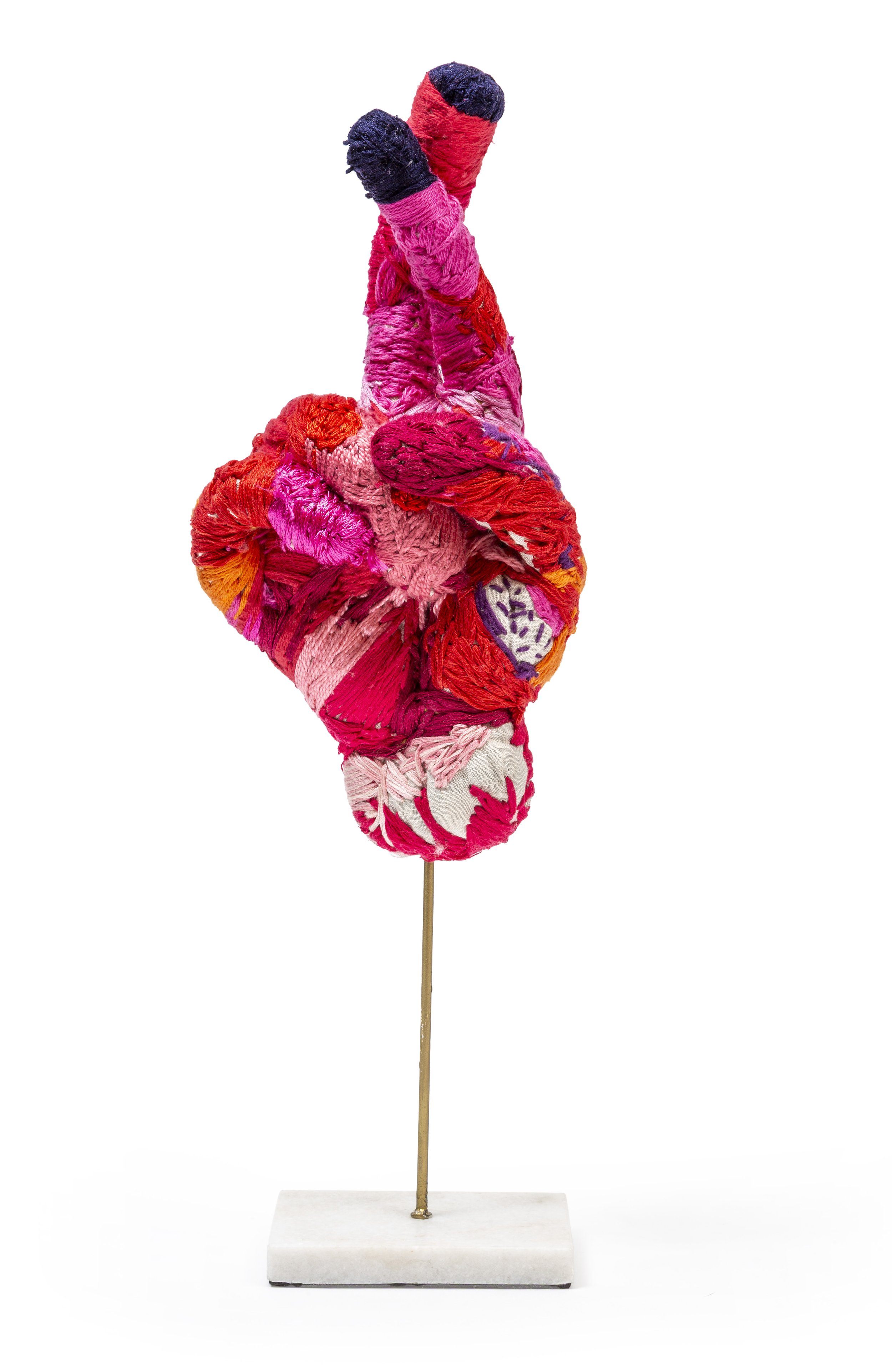 A Small Celebration                                       2025  
Linen, cotton, silk, wool, stone, brass
42 × 15 × 12 cm