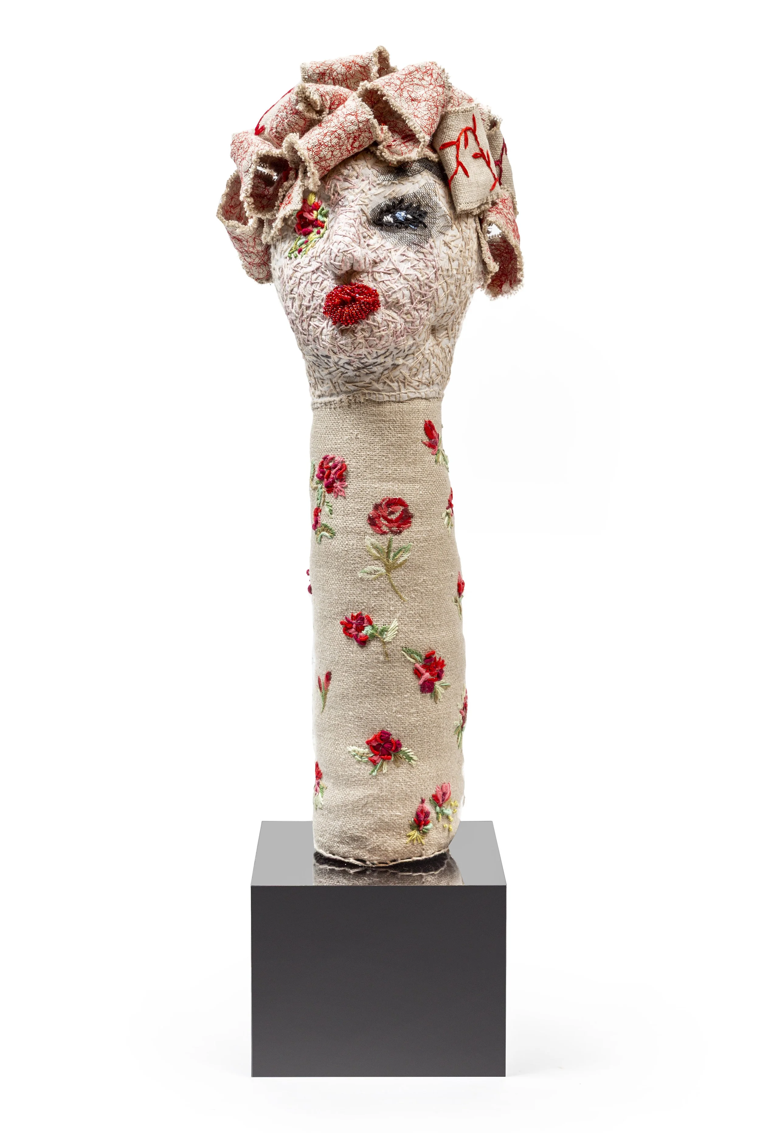 The Silent Type. Ish                                    2025
Linen, cotton, wool, porcelain, glass beads, newspaper
45 × 15 × 12 cm