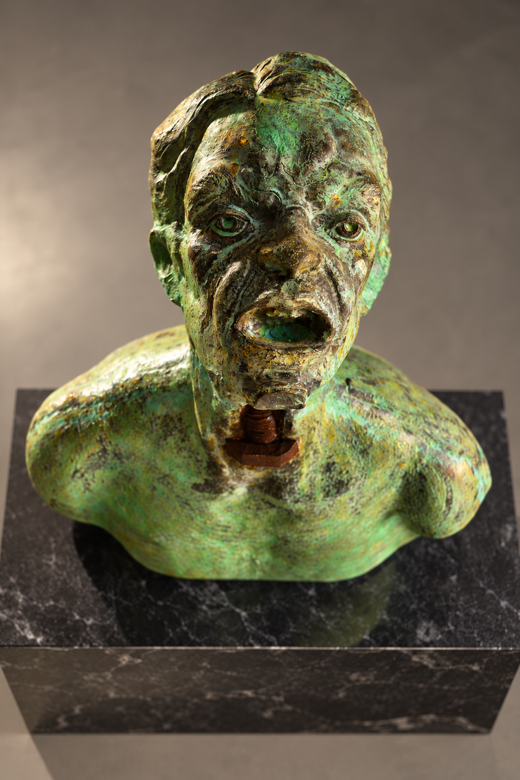 Patinated Bronze Bust of Anguish.png