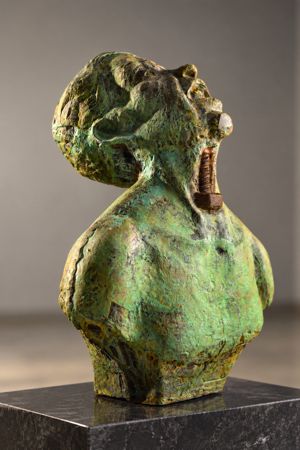 Weathered Verdigris Bust on Marble Plinth.png