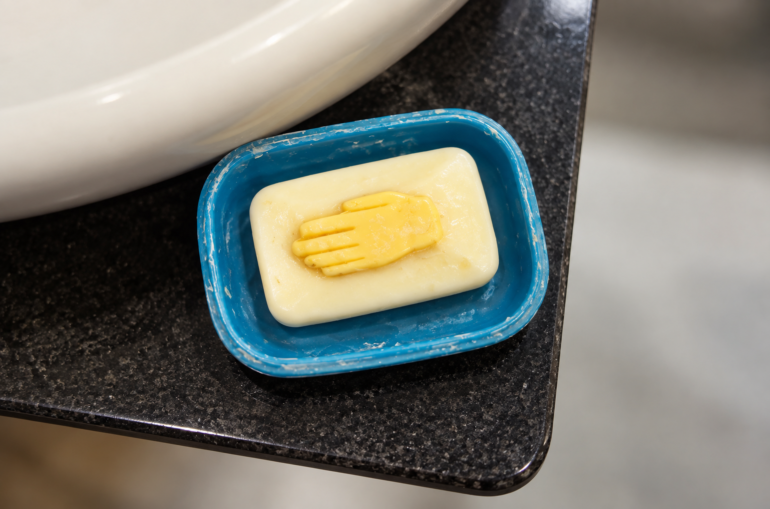 Teal Soap Dish with Hand Motif.png