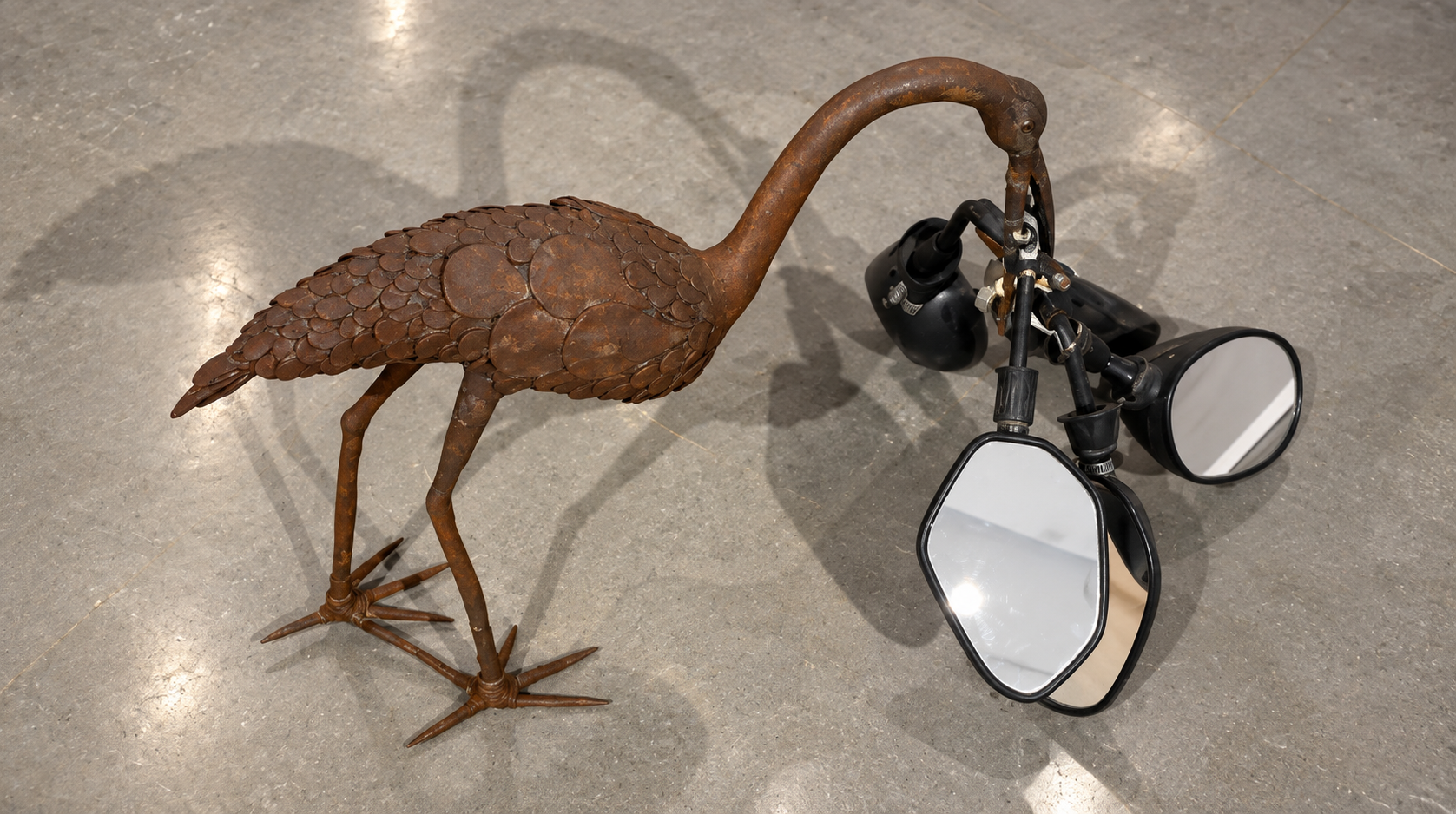 Rusty Crane Sculpture and Mirror Cluster.png